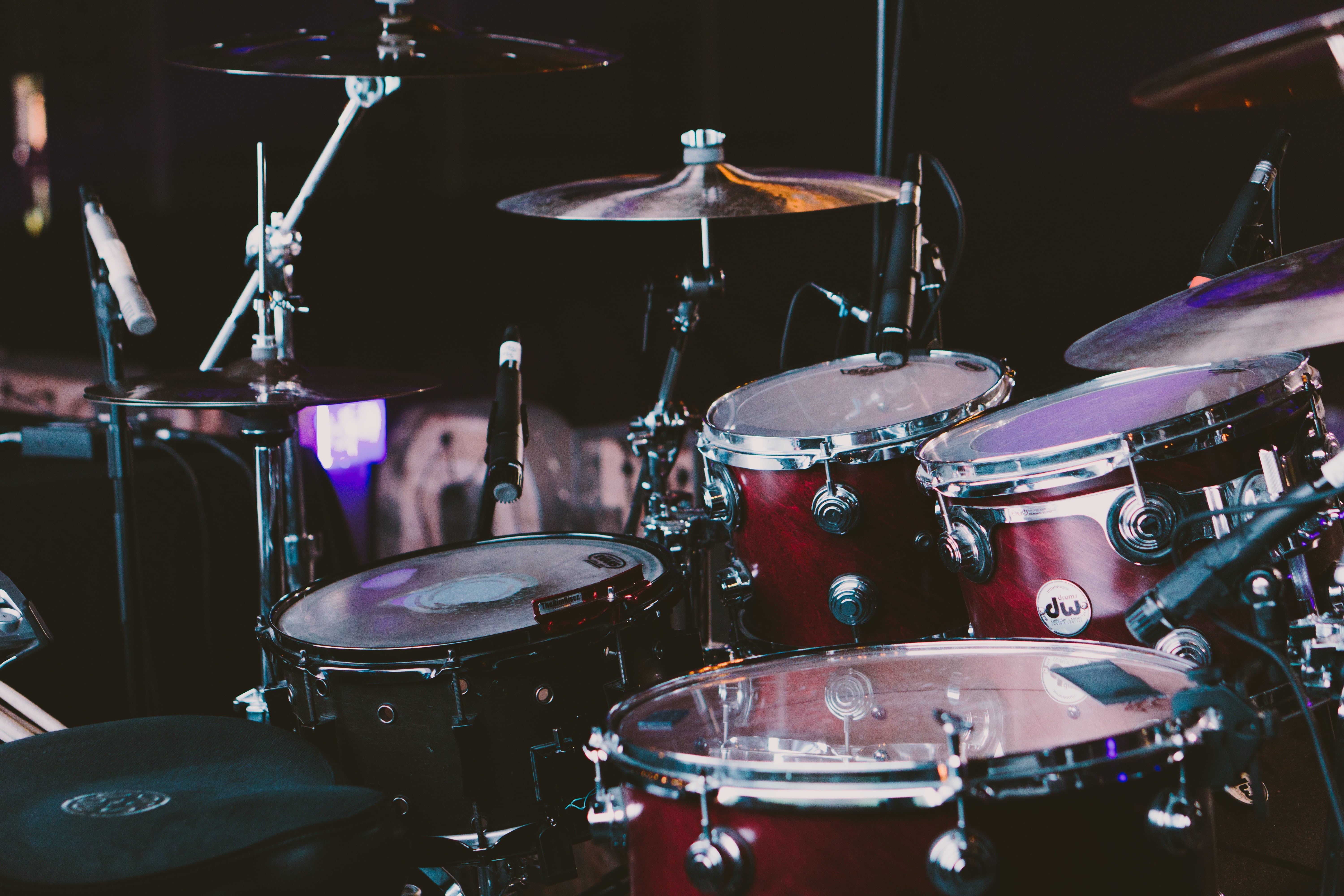 drum kit, drum - percussion instrument, percussion instrument, musical instrument, indoors, event, modern rock, artist, occupation, red, musical equipment, HD Wallpaper