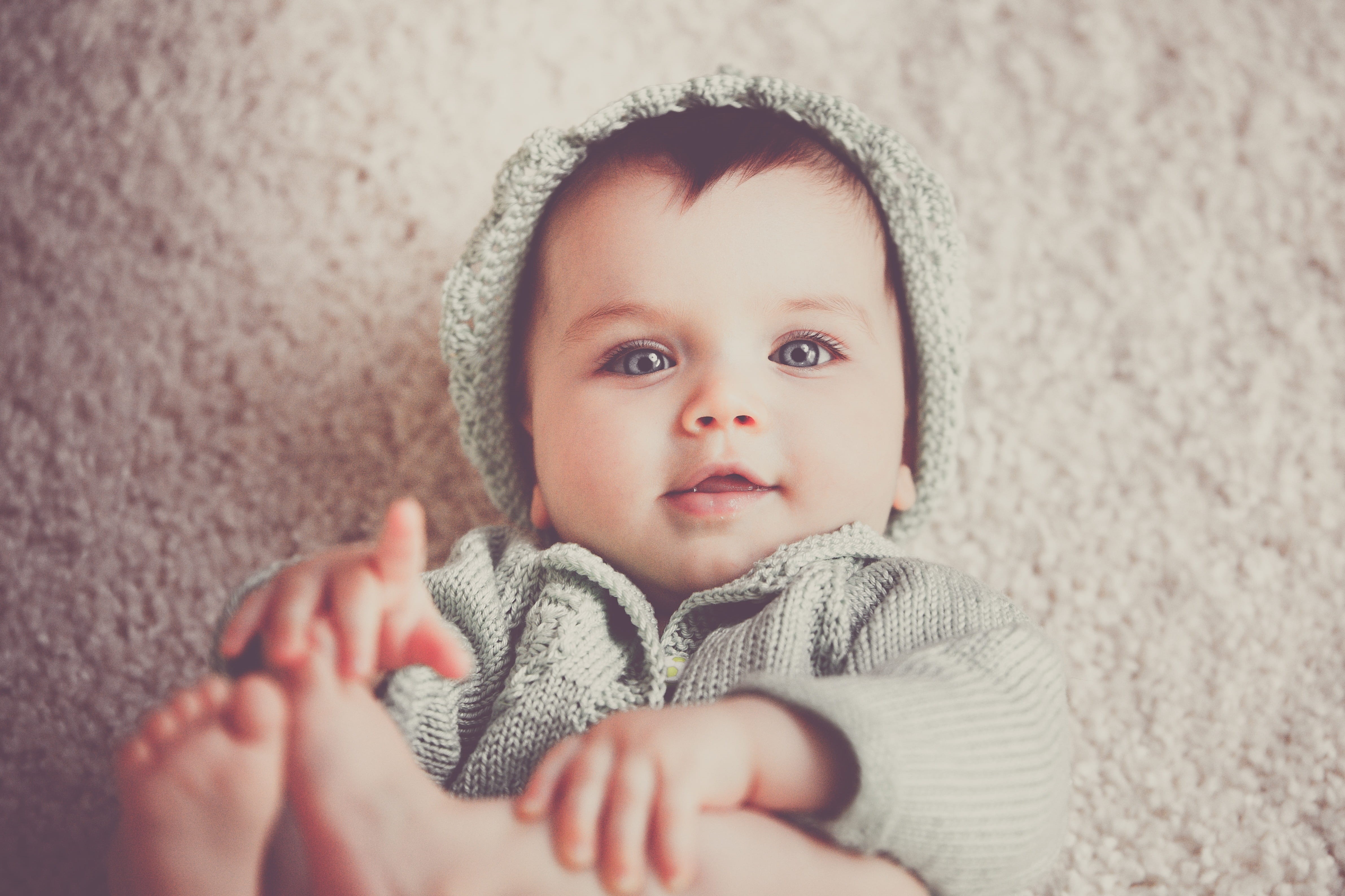 gray, toddler, looking at camera, eyes, smiling, knit, innocence, portrait, person, one person, little, cover, baby clothing, warmly, cute, happiness, young, HD Wallpaper