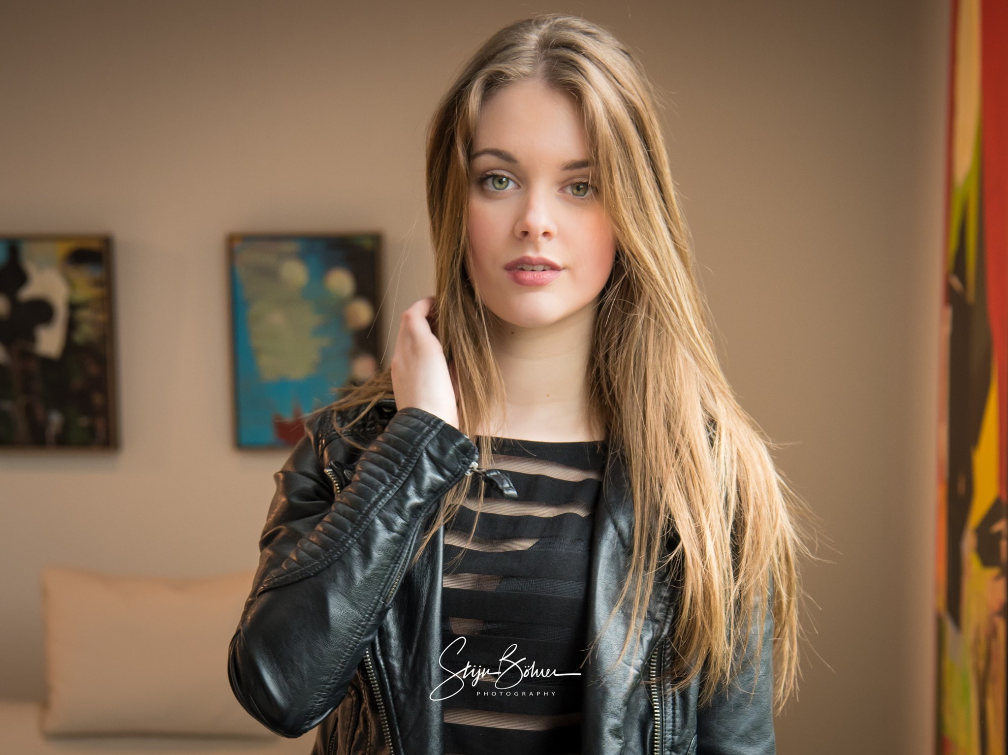 women, open jacket, Stijn Böhrer, green eyes, portrait, blonde, touching hair, black clothing, women indoors, long hair, leather jackets, straight hair, HD Wallpaper