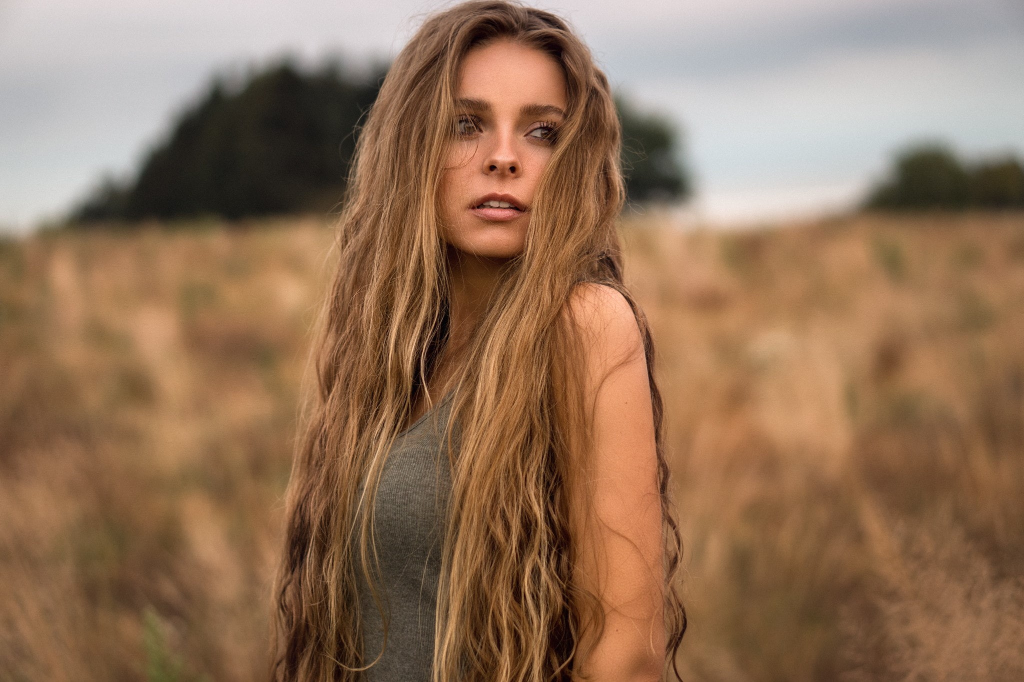 beauty, teenager, hair in face, contemplation, land, blond hair, one person, open mouth, looking at camera, 1080P, hair, adolescence, landscape, adult, HD Wallpaper