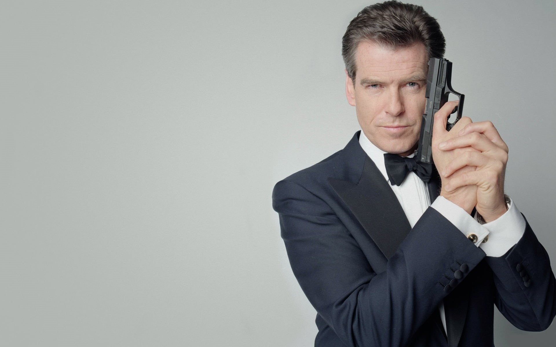 males, Pierce Brosnan, indoors, men, communication, technology, s, jacket, well-dressed, gun, studio shot, one person, front view, using phone, copy space, HD Wallpaper