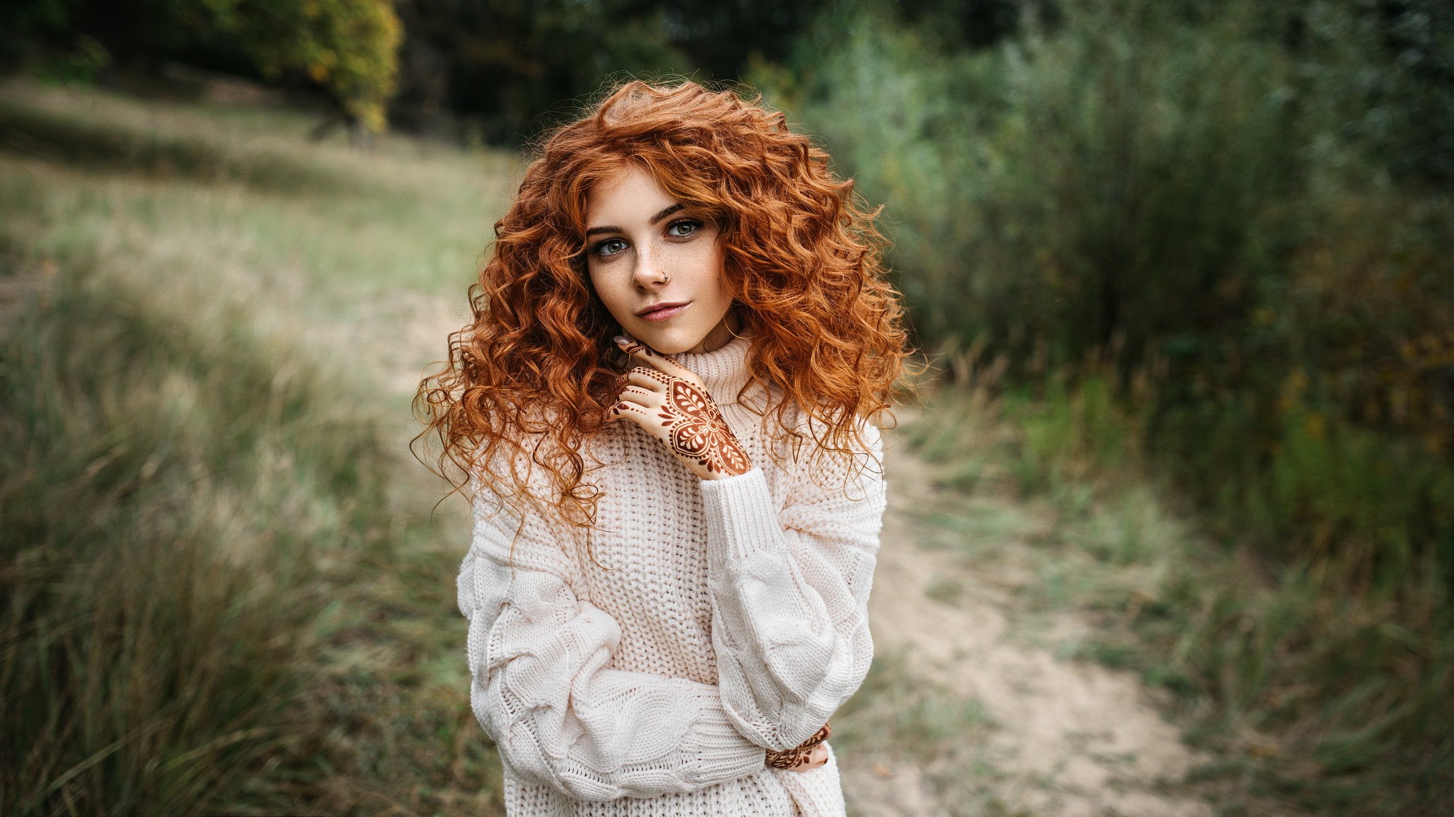 Igor Kondukov, curly hair, pierced nose, freckles, 1080P, redhead, white clothing, tattoo, sweater, smiling, piercing, women, nature, long hair, looking, HD Wallpaper