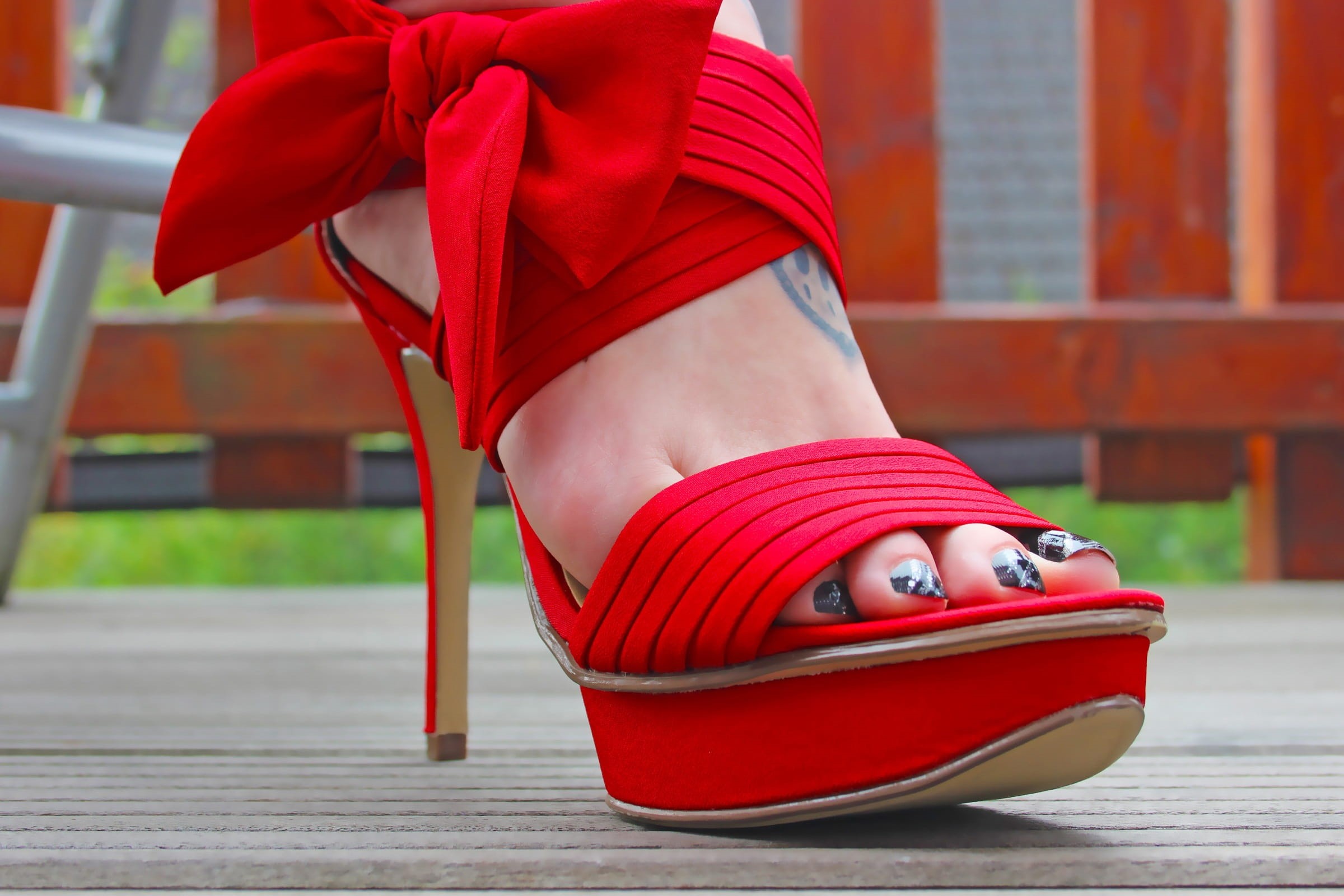 1080P, clothing, high heel, heeled, women, outdoors, fashion, human body part, seat, wood - material, day, sitting, adult, shoe, red, lifestyles, wear, HD Wallpaper