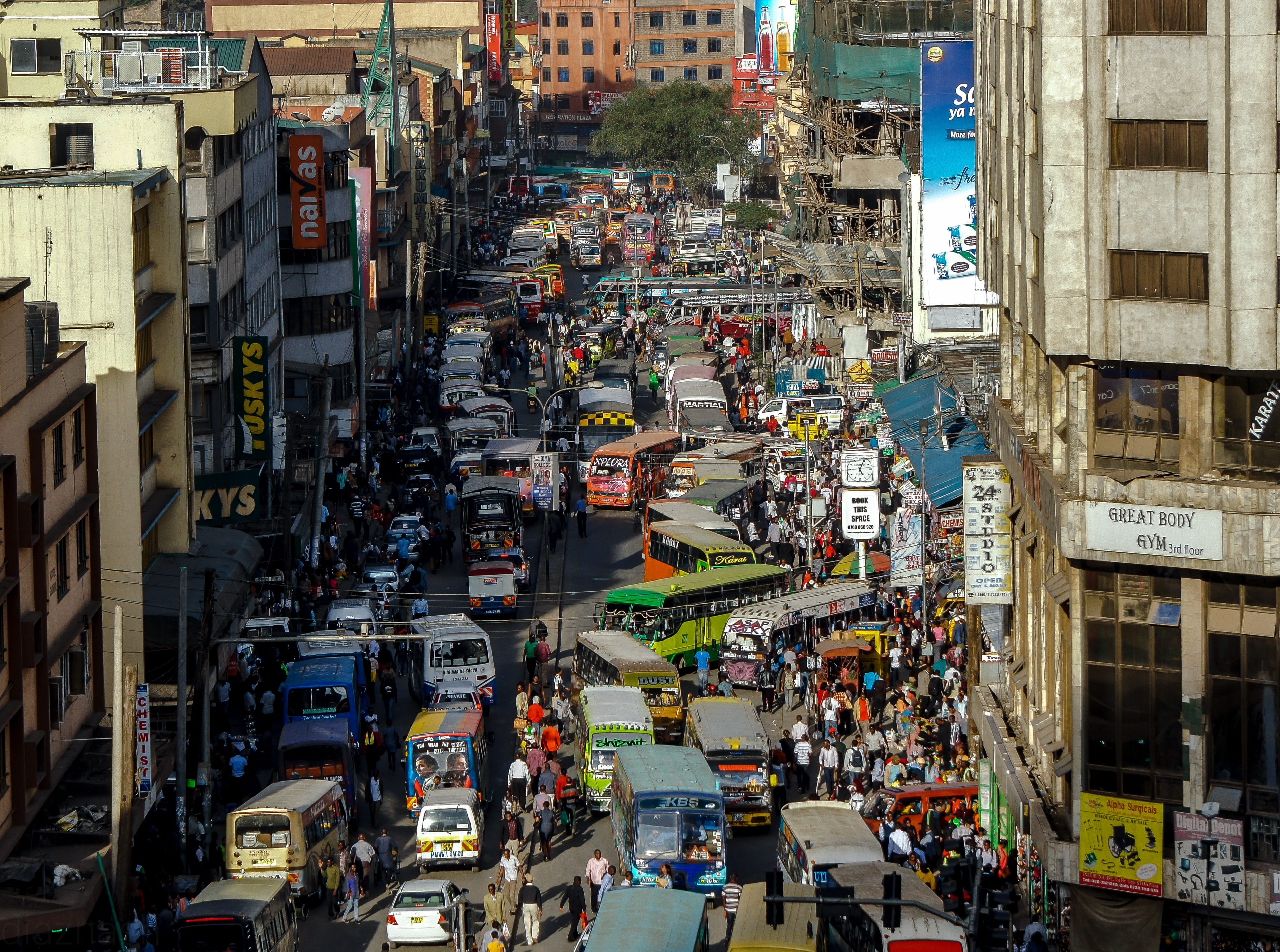car, city street, district, crowd, urban, business, large group of people, nairobi, road, streets, day, outdoors, built structure, building exterior, traffic, HD Wallpaper
