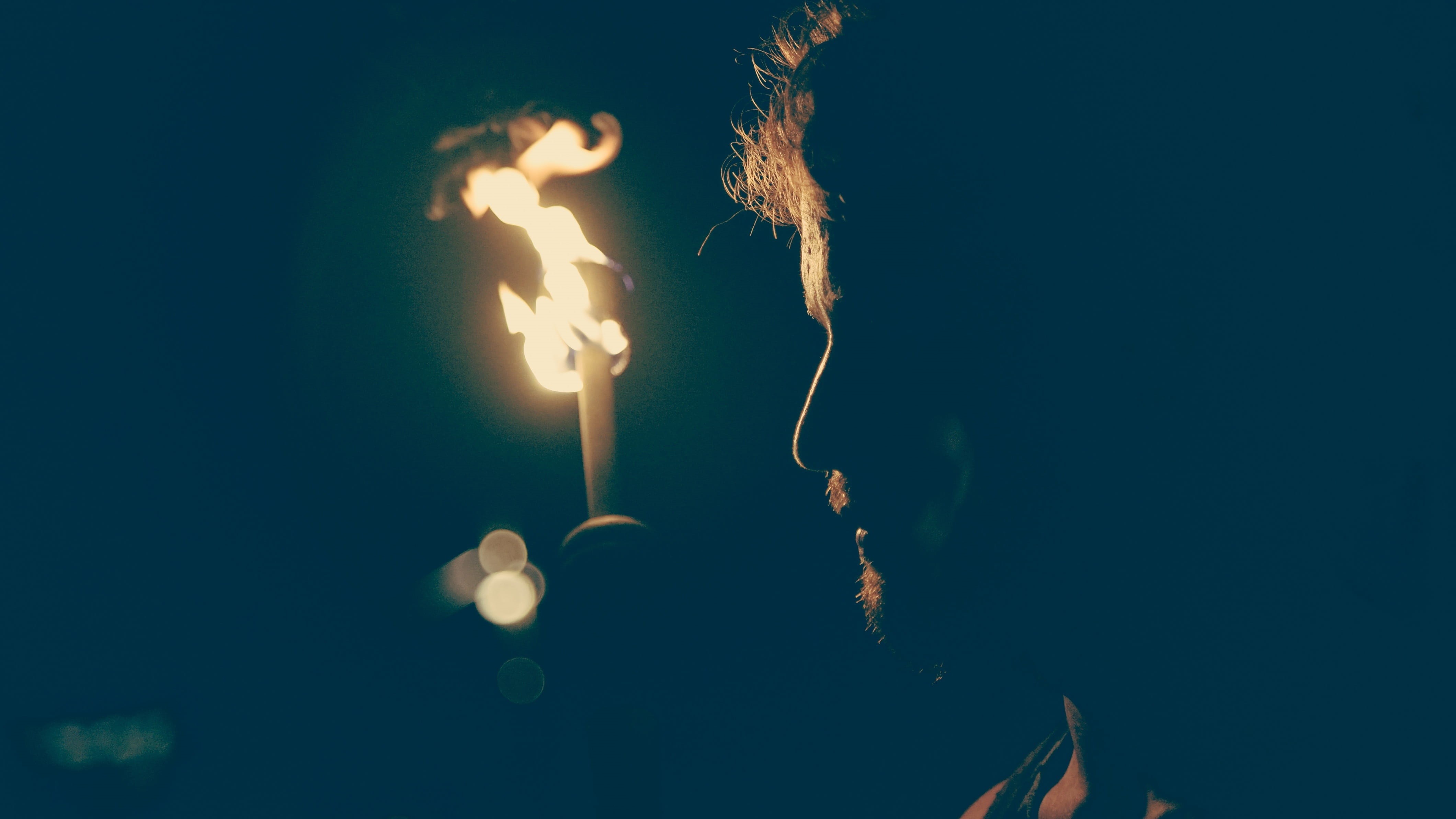 outdoors, burning, adult, technology, lighting equipment, dark, man, music, human body part, one person, illuminated, sad, communication, night, light bulb, HD Wallpaper