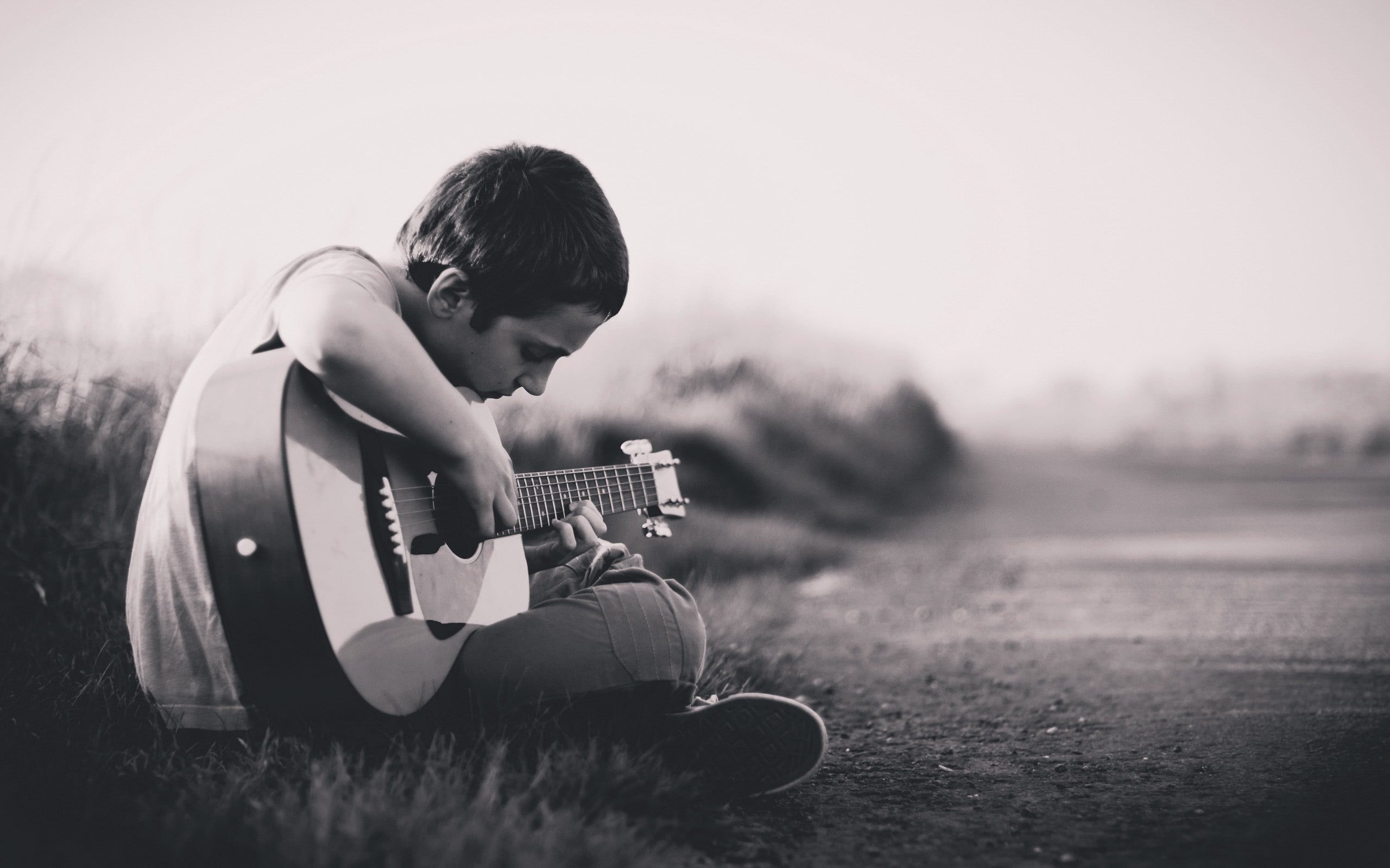 acoustic, 2K, musician, outdoors, sitting, string instrument, casual clothing, child, real people, dreadnought, field, grass, music, innocence, leisure activity, HD Wallpaper