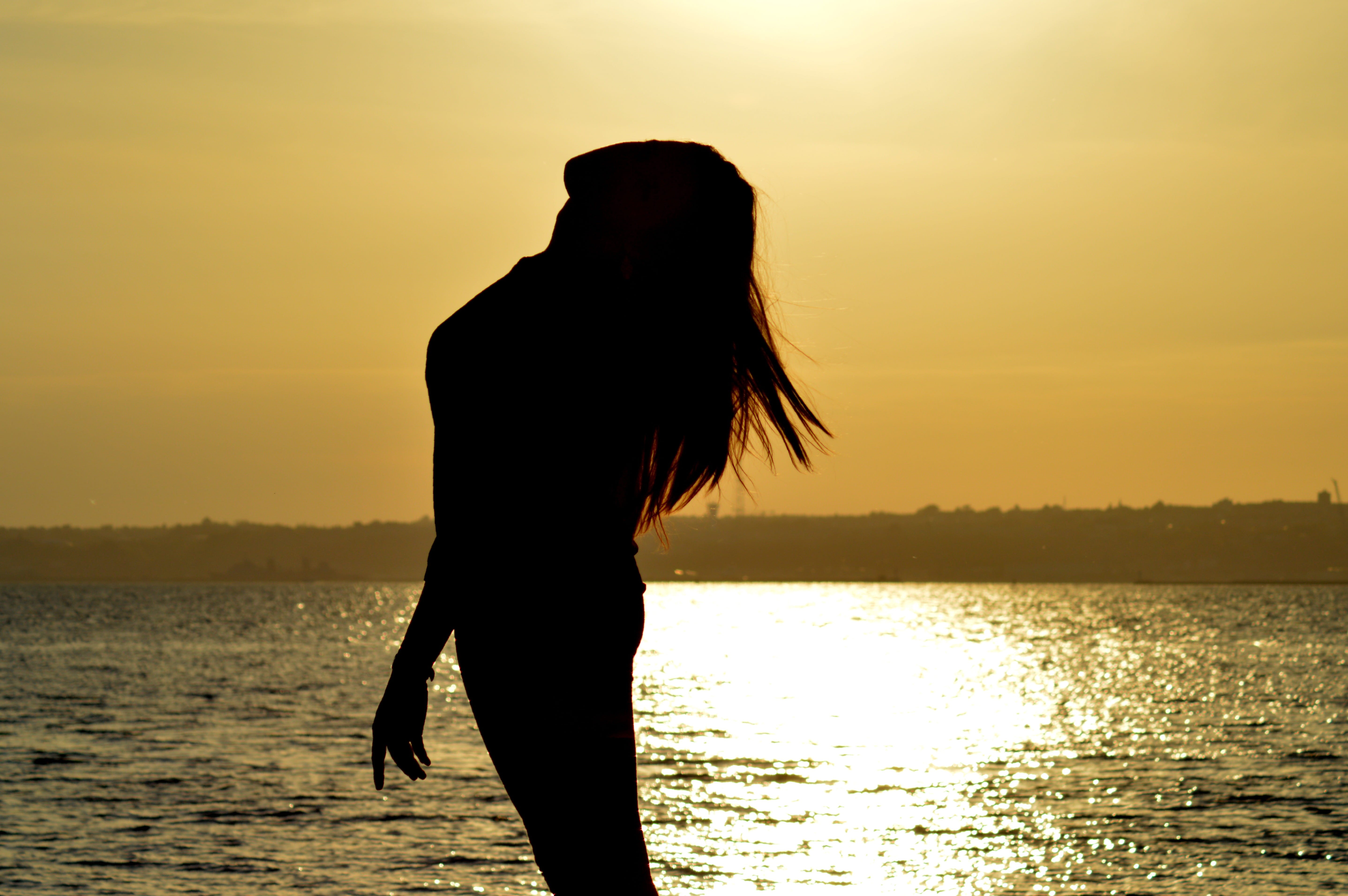 beach, vacations, one Person, females, waterfront, standing, sunset on the sea, sky, sun set, near, orange color, outdoors, ocean, body, nature, people, HD Wallpaper