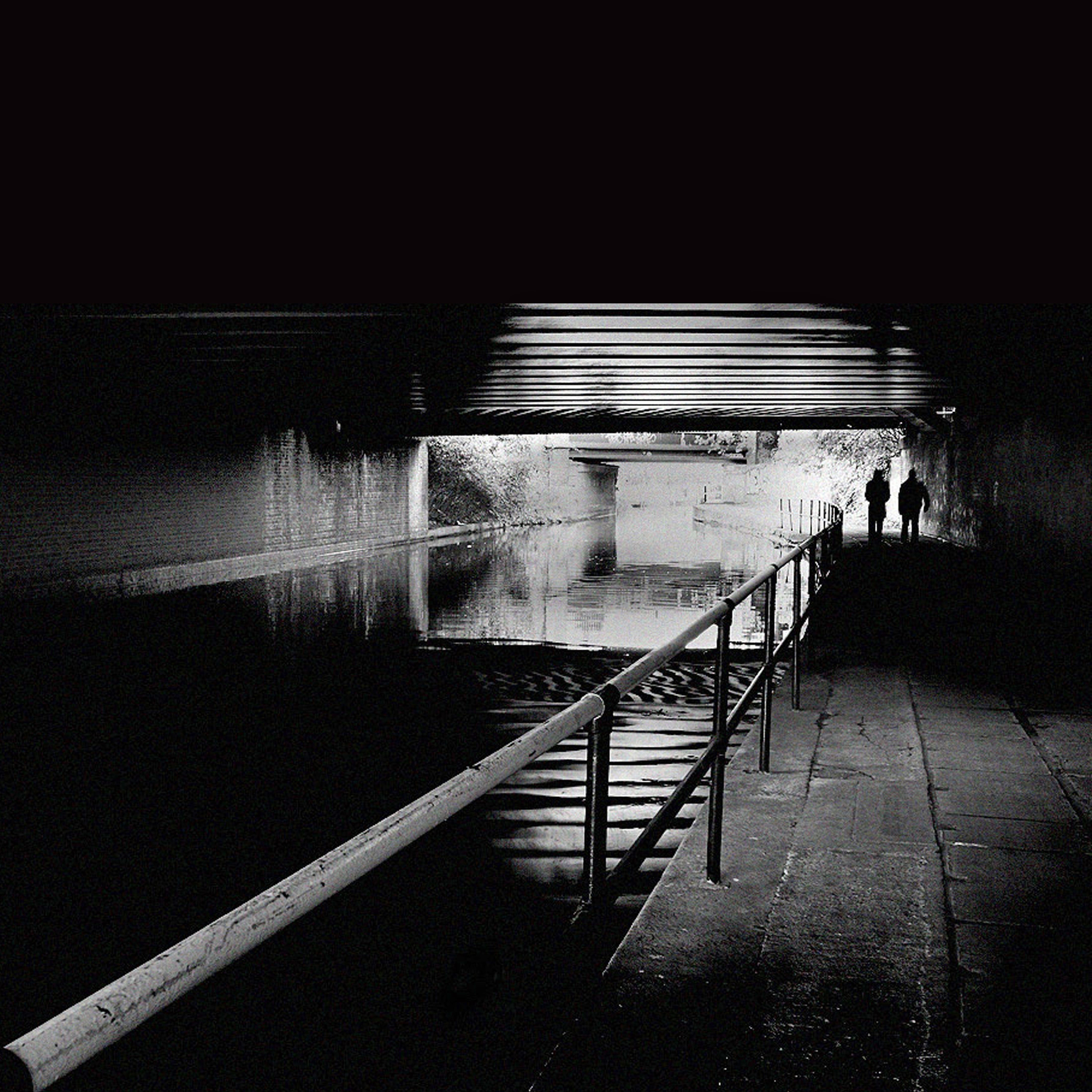 outdoors, tunnel, Tunnel, architecture, day, reflection, walking, railing, water, people, black, dark, exit, Path, Black, adult, only men, real people, Phone HD Wallpaper