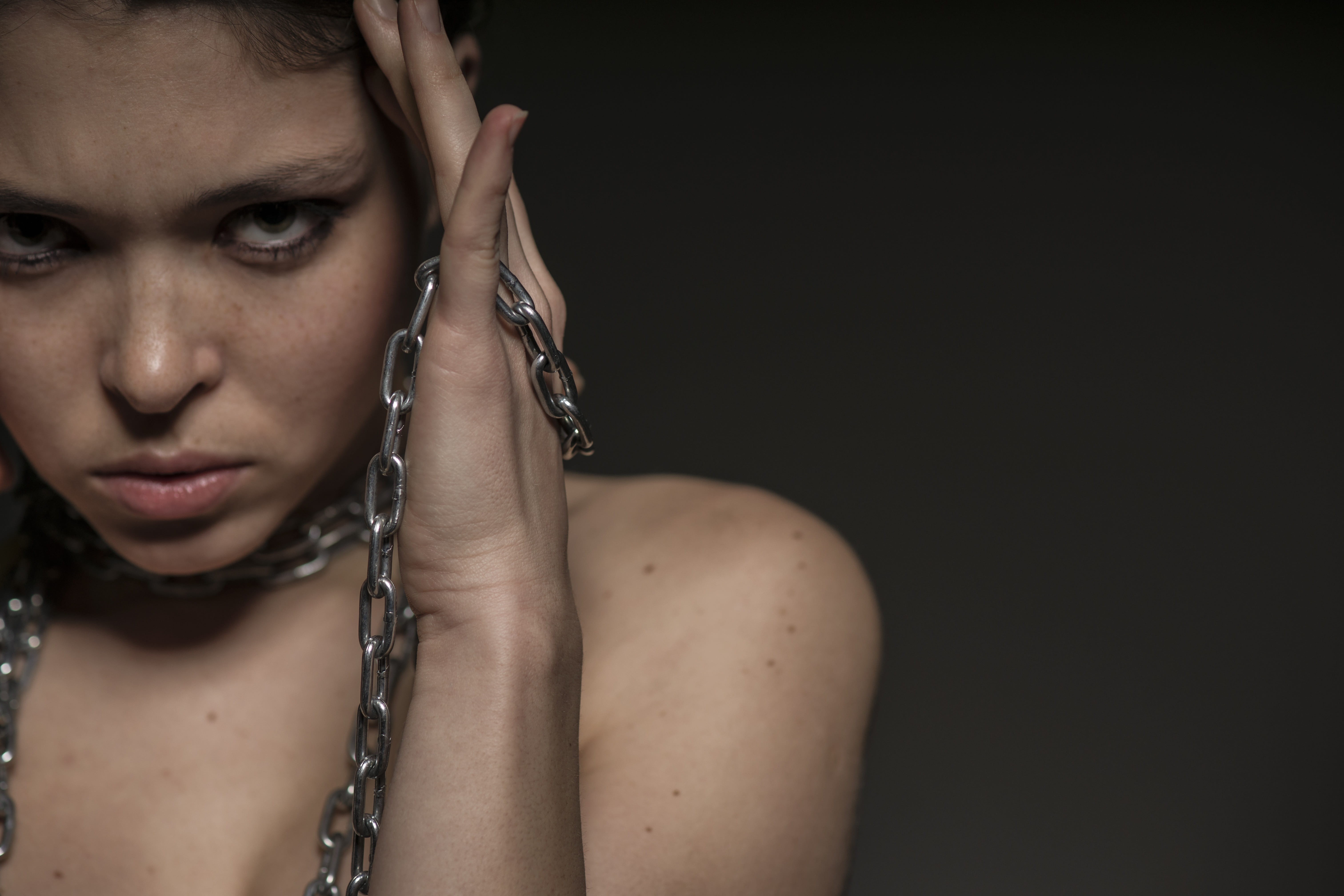 the innocence, beauty model, steel chain, passion, studio shot, indoors, human body part, fashion, headshot, aggression, look, the young woman, black background, HD Wallpaper
