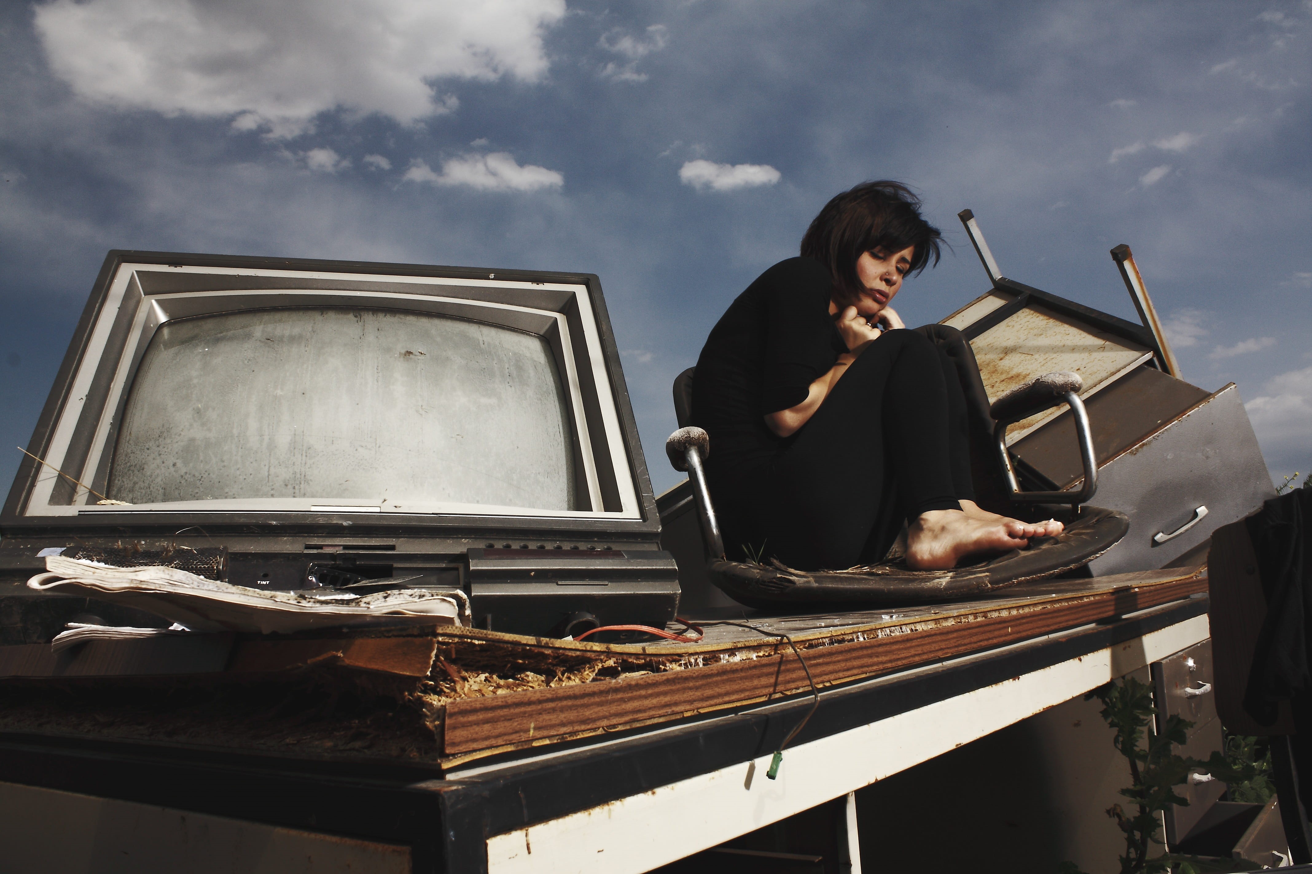 cloud - sky, crt, keyboard, adult, portrait, waist up, sad, young model, abandoned, young women, communication, junkyard, people, sitting, beautiful, fiction, HD Wallpaper