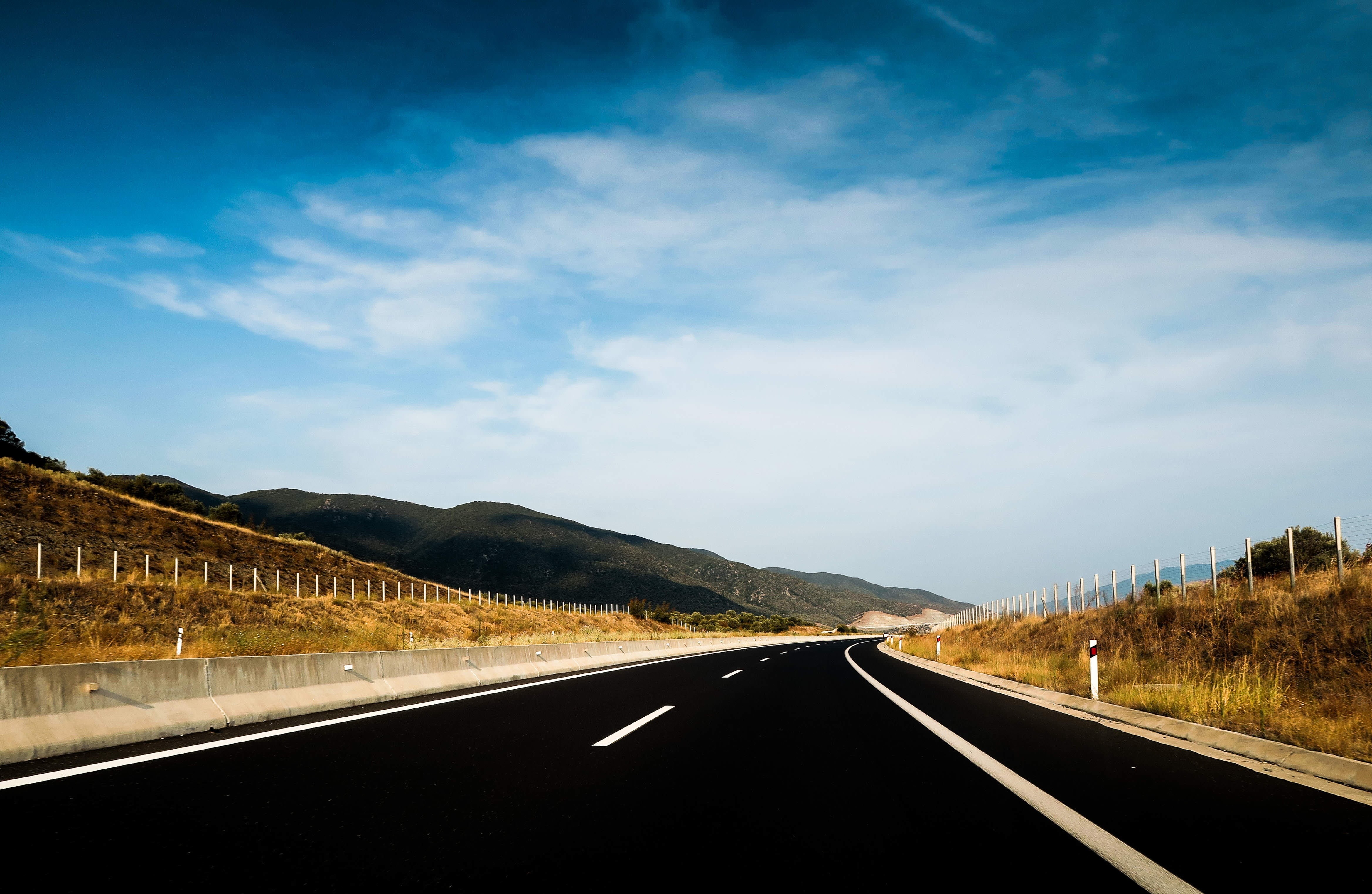 environment, concrete barriers, scenics - nature, marking, road trip, white, winding road, roadway, country, travel, covered, mountain, connection, cloud - sky, HD Wallpaper