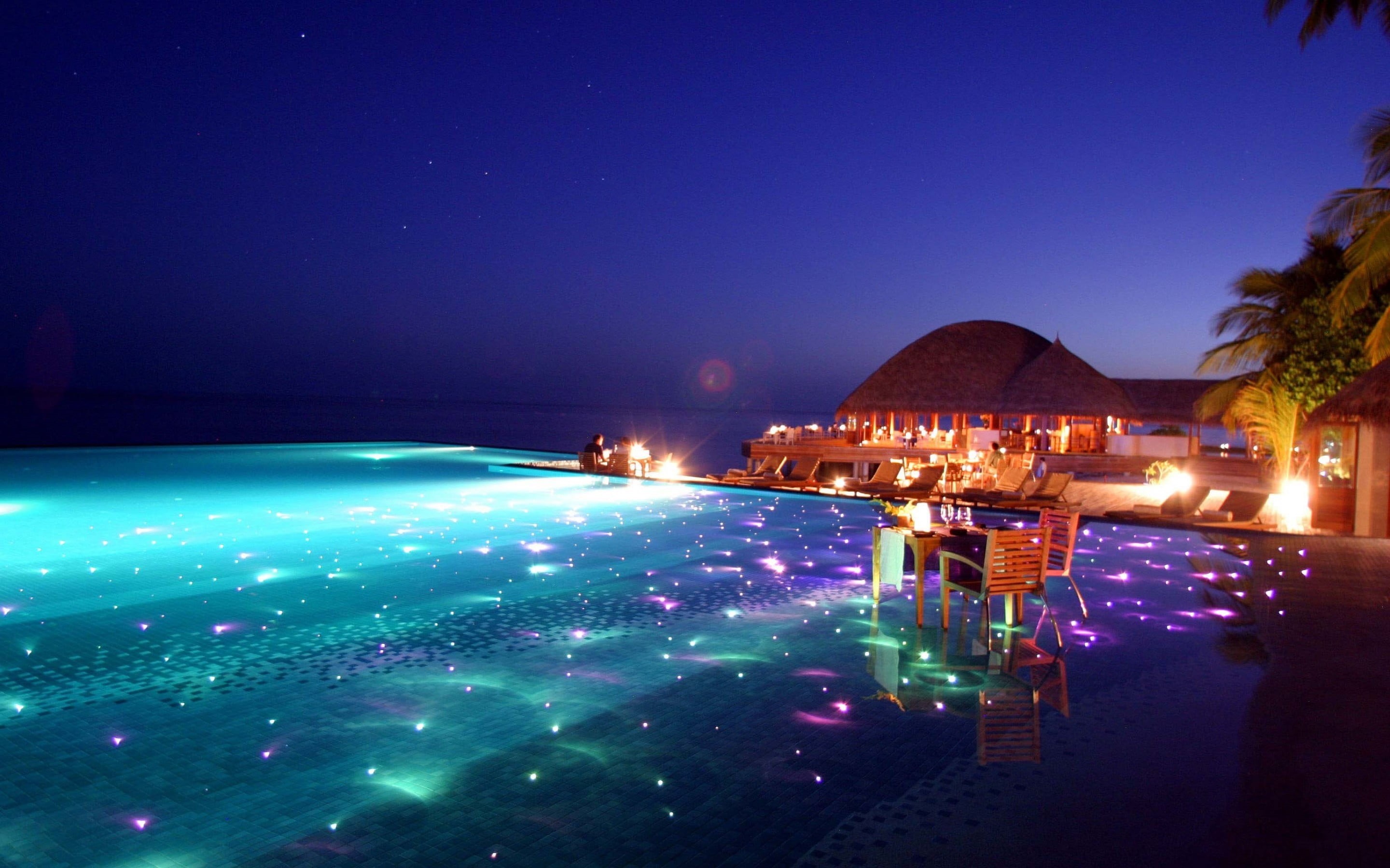no people, sky, luxury, 2K, architecture, glowing, swimming pool, building exterior, body, hotel, lighting equipment, travel, clear sky, travel destinations, HD Wallpaper