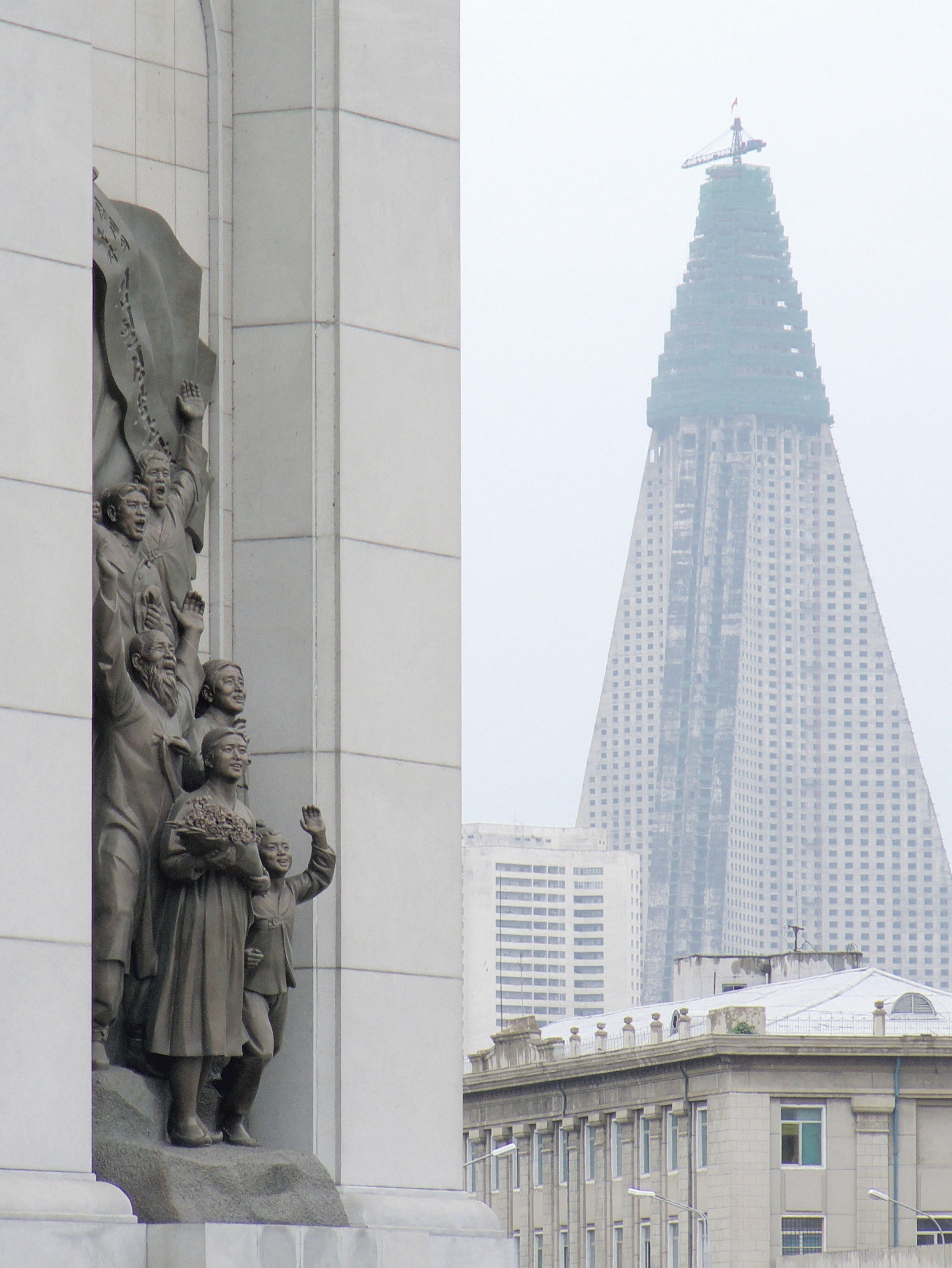 built structure, building exterior, skyscraper, human representation, DPRK, sculpture, representation, office building exterior, no people, low angle view, Phone HD Wallpaper