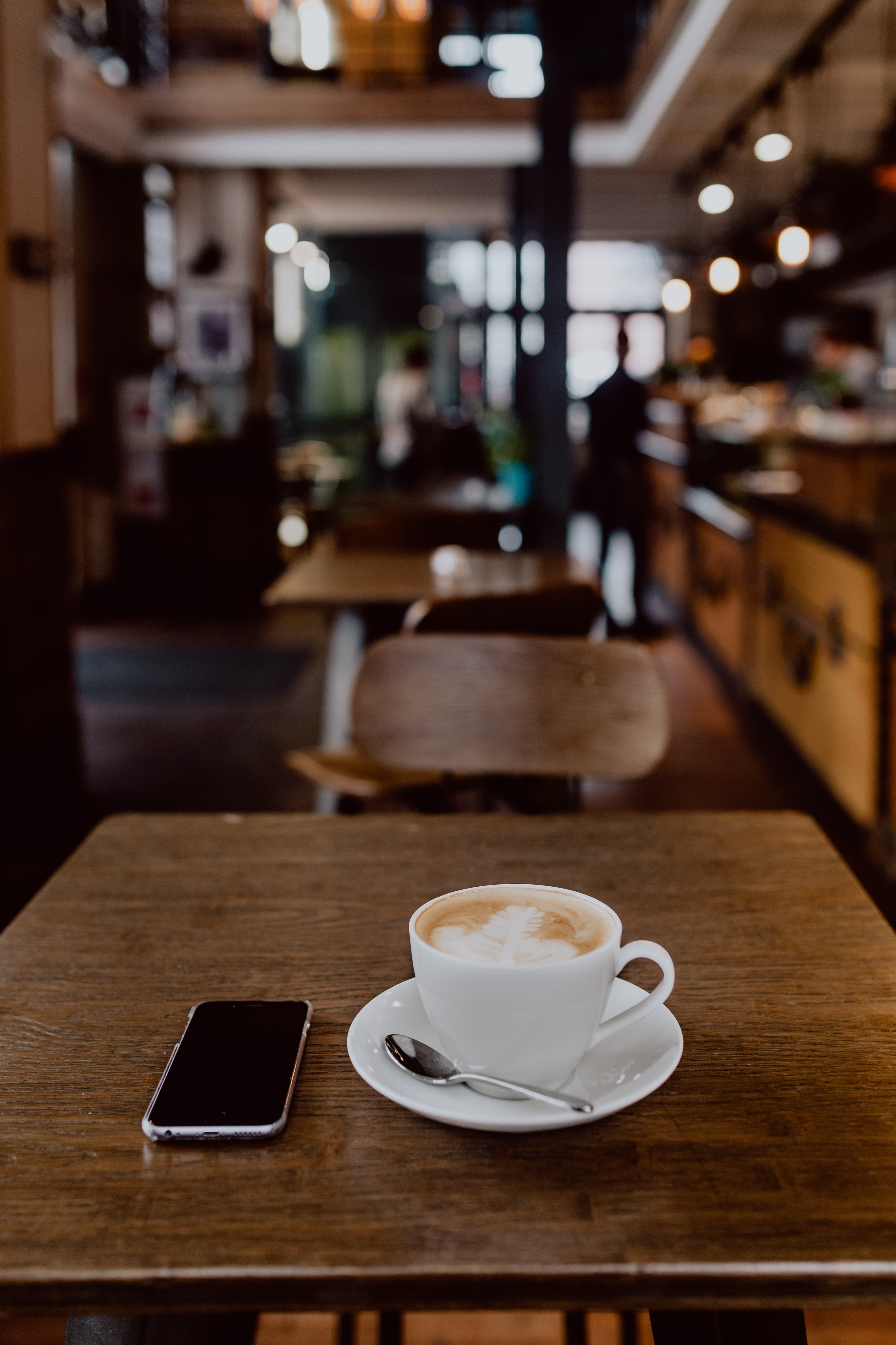 table, crockery, mug, work, cafe, 5K, wireless technology, frothy drink, tech, freshness, restaurant, cappucino, focus on foreground, drink, cup, business, Phone HD Wallpaper