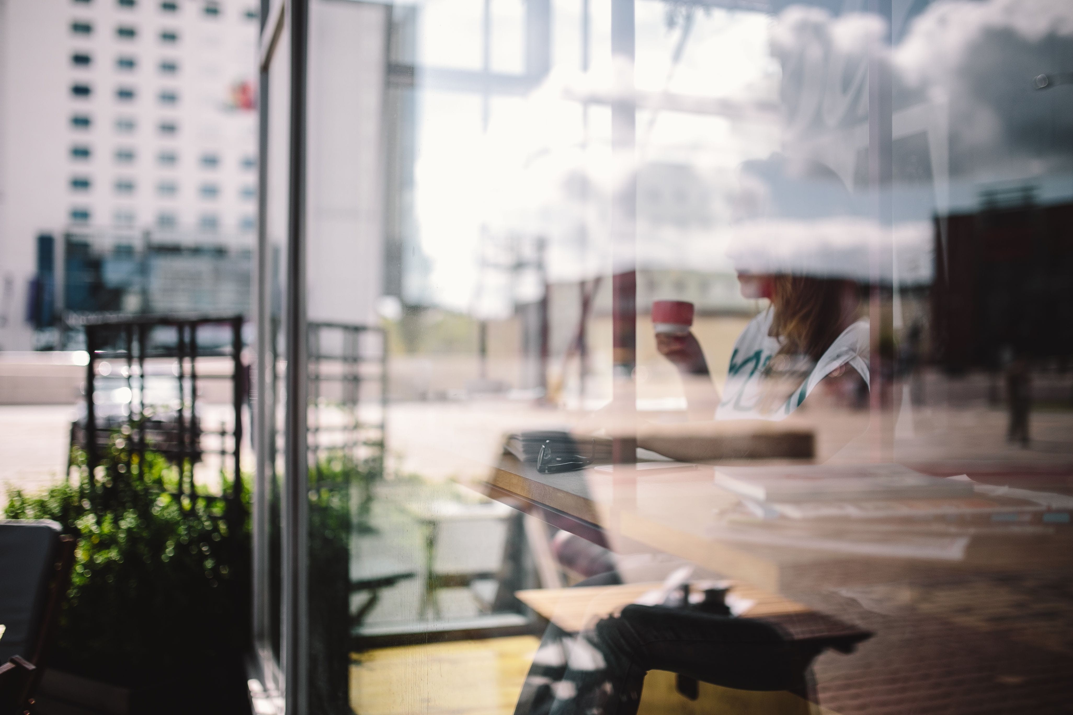 looking through window, business, day, sitting, side view, contemplation, built Structure, city, woman, indoors, men, Woman reading, adult, outdoors, lifestyles, HD Wallpaper