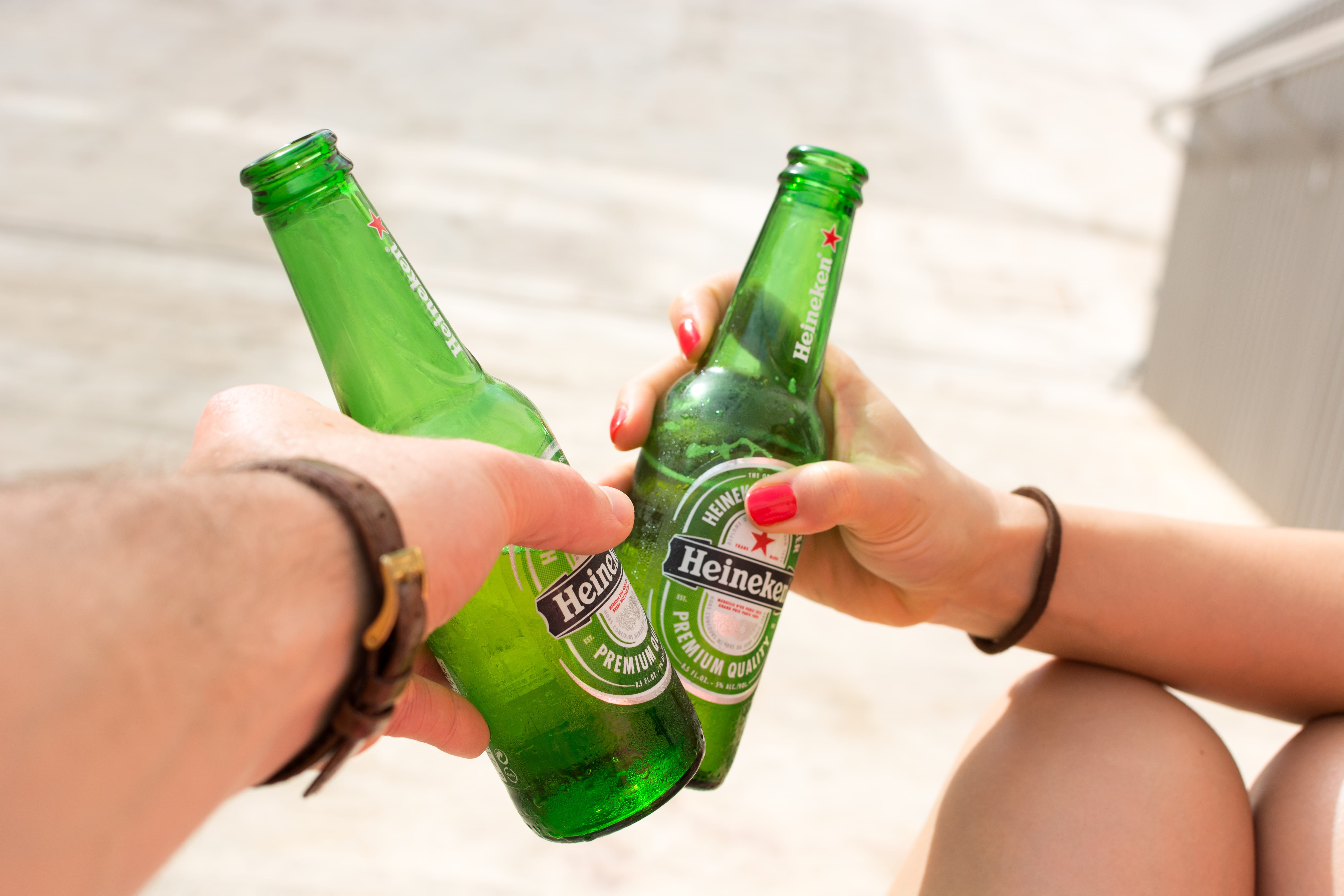 hands, green color, people, alcohol Abuse, beer, Heineken, beer Bottle, day, holding, alcohol, hand, 5K, real people, finger, refreshment, outdoors, nature, HD Wallpaper