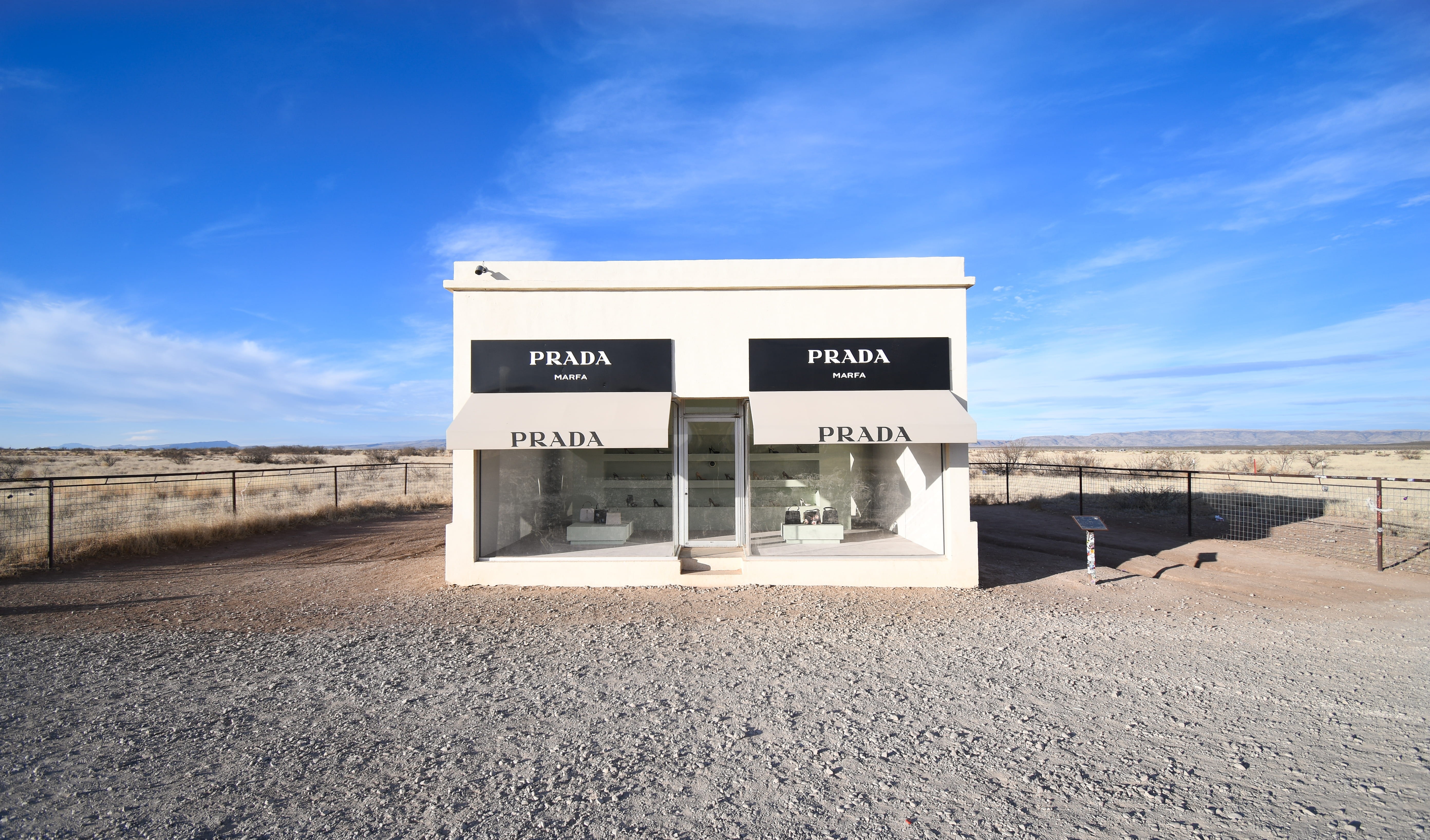 sunlight, white, day, nature, prada, sky, facade, blue, mailbox, cloud - sky, information sign, architecture, desert, built structure, road, information, HD Wallpaper