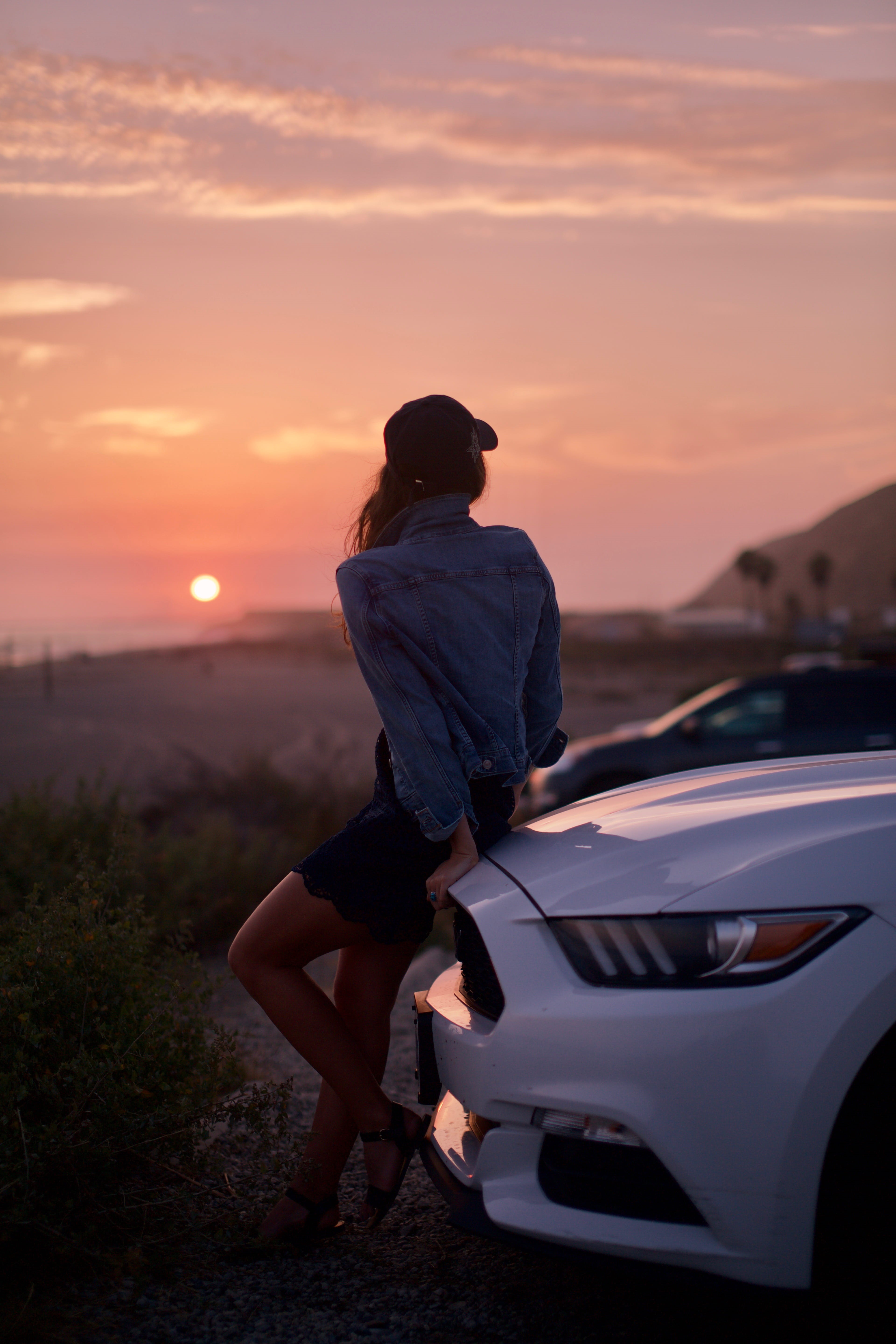 people, leisure activity, lifestyles, bumper, ford, cloud - sky, gt, dirt road, leisure activities, golden, standing, young adult, hour, malibu, vehicle, Phone HD Wallpaper