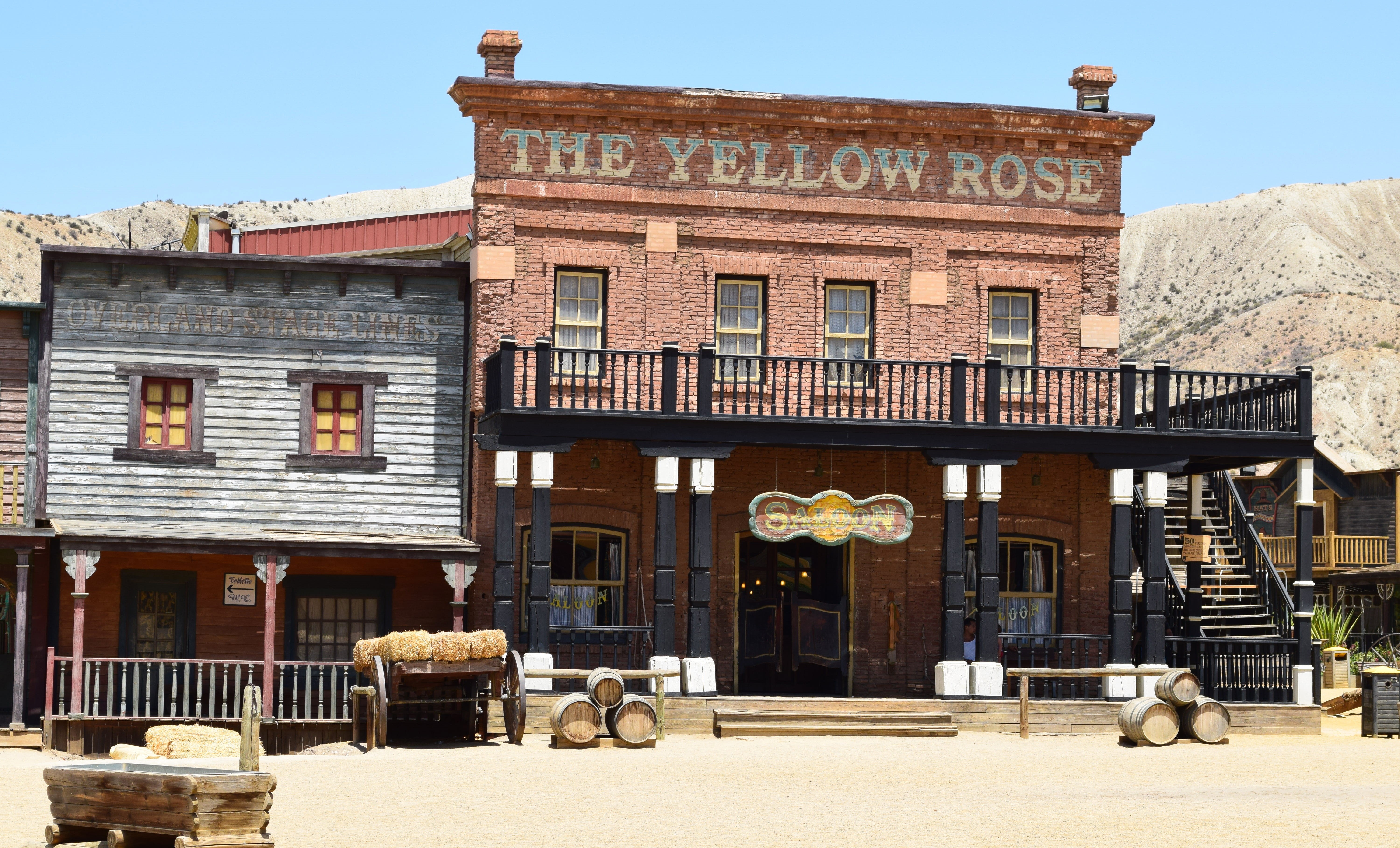 american, house, window, day, western style, sky, facade, 5K, The Yellow Rose, yellow, architecture, no people, clear sky, saloon, entrance, tourism, bar, HD Wallpaper
