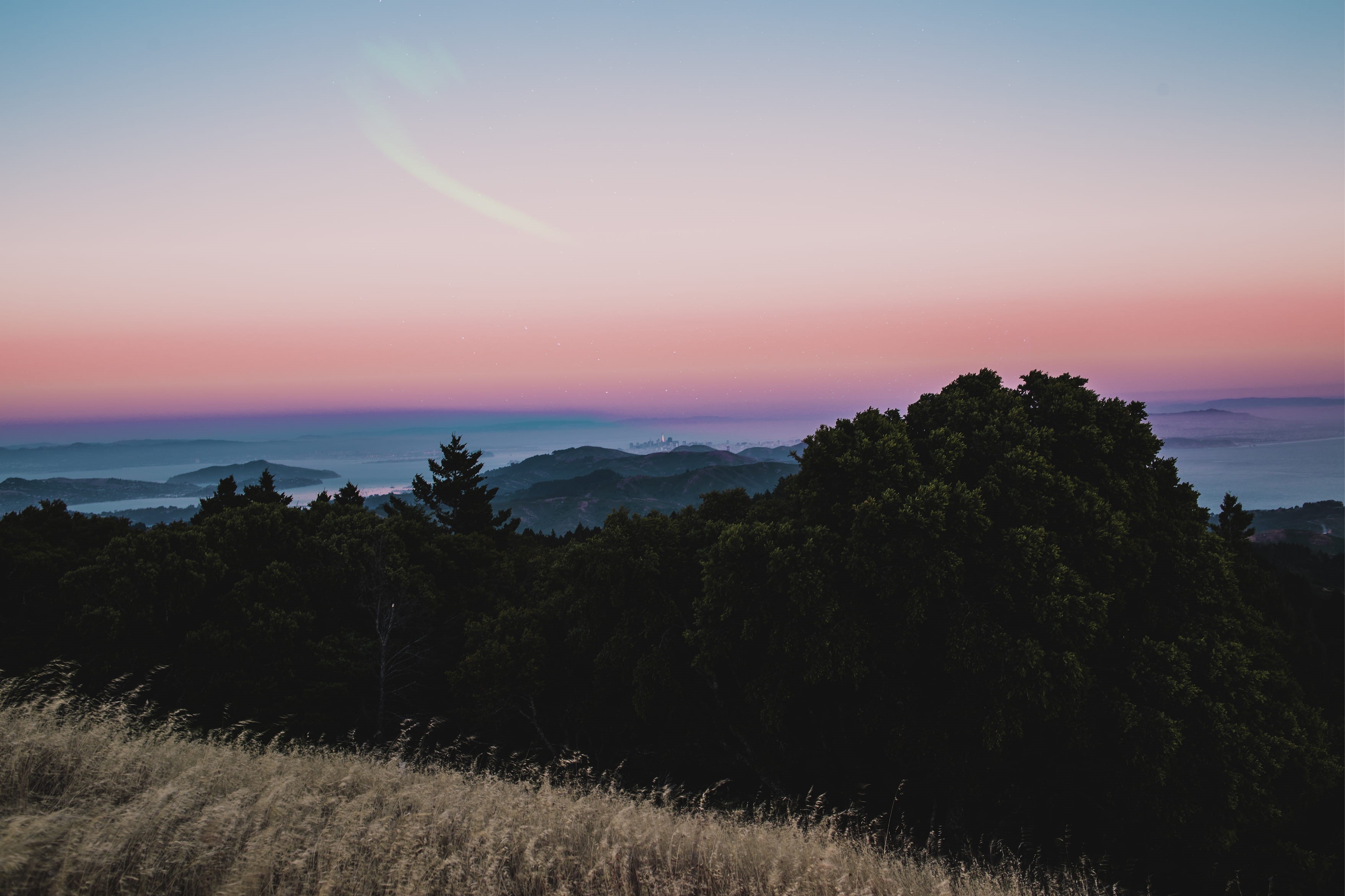sunset, light - Natural Phenomenon, tree, sunlight, dawn, mountain, forest, backgrounds, horizon line, outdoors, calming, 2K, scenics, rural Scene, blue, HD Wallpaper