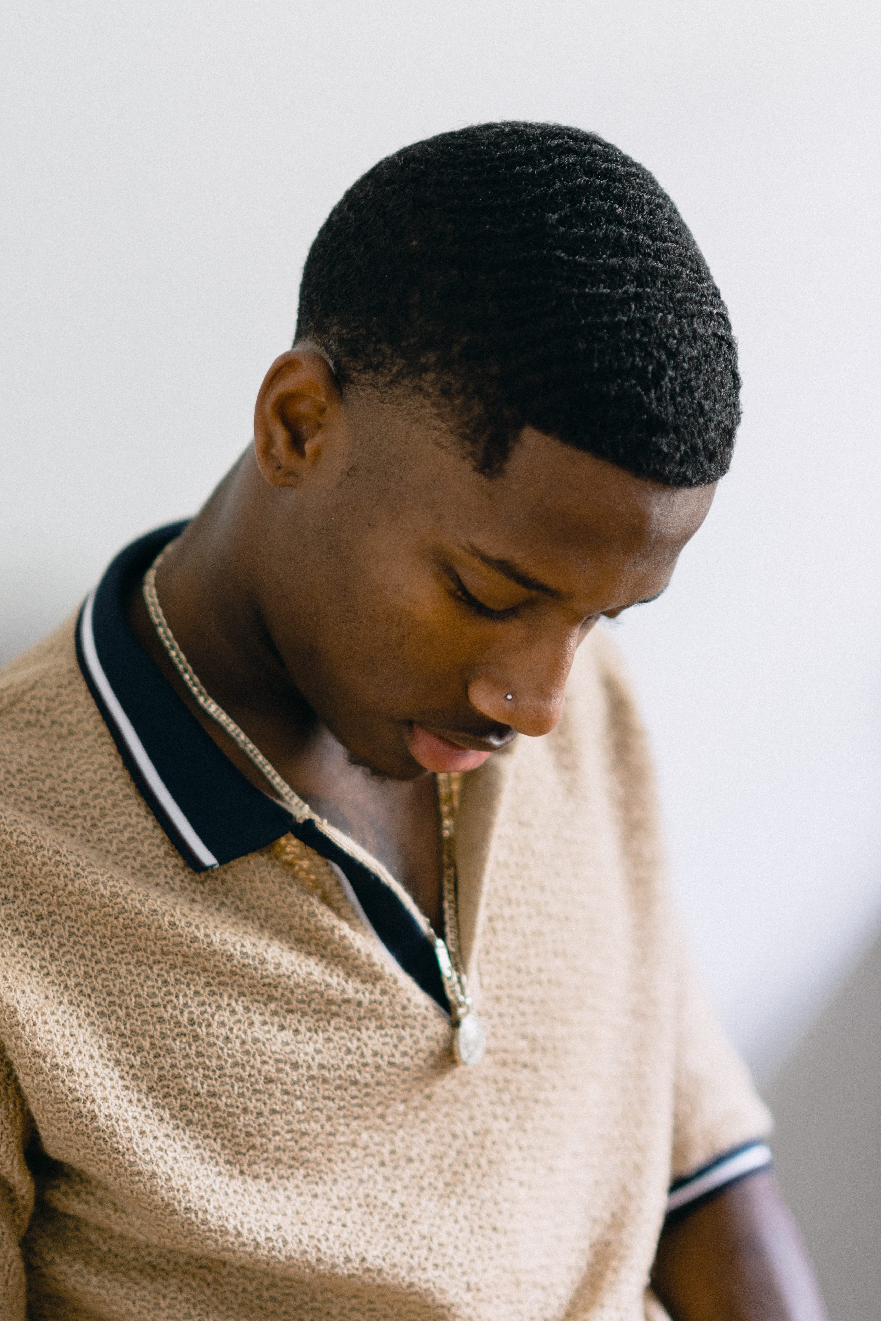 polo, express more, male, lifestyles, man, looking down, headshot, indoors, portrait, 5K, african american, shirt, male portrait, wall - building feature, Phone HD Wallpaper