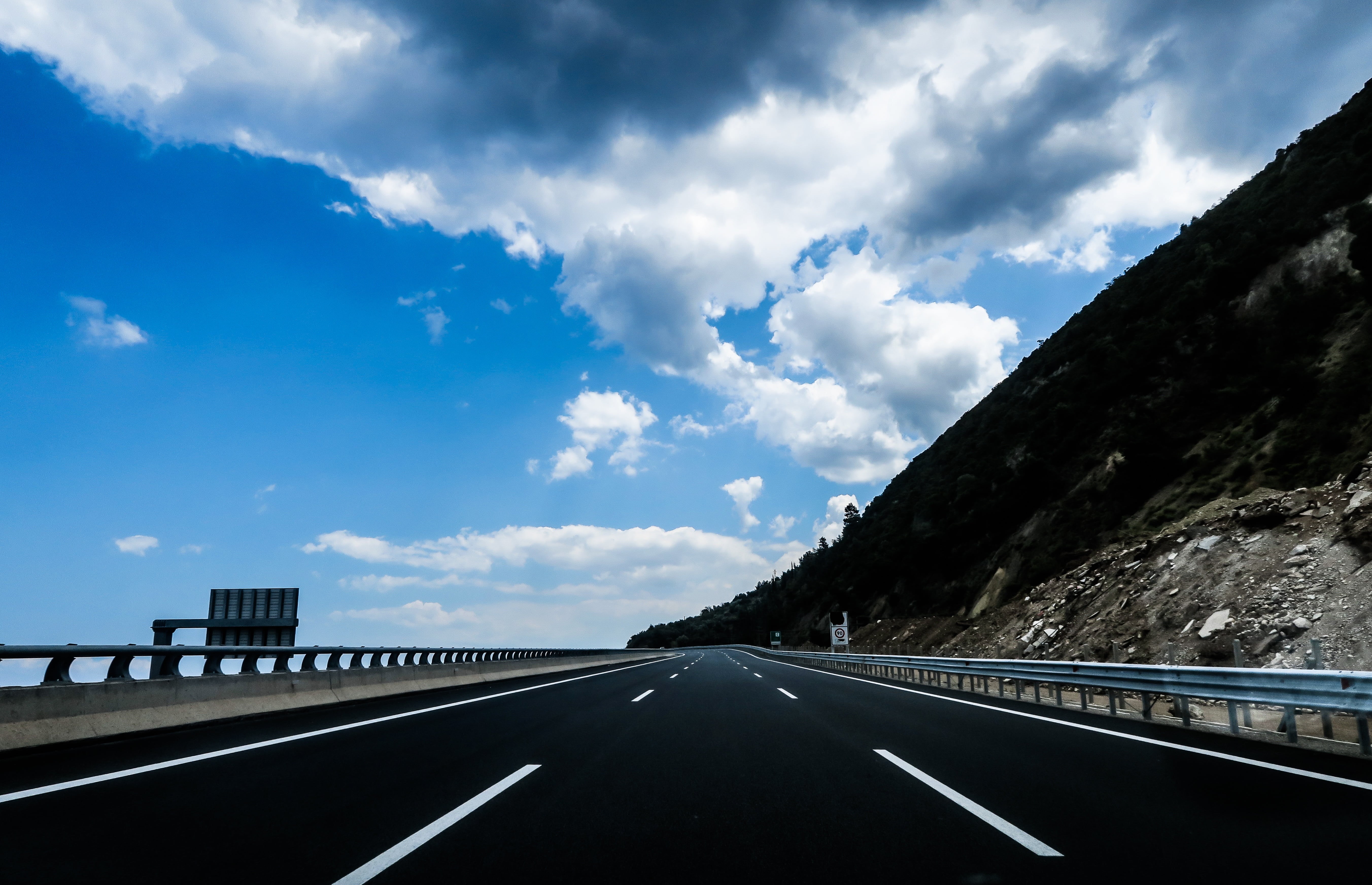 scenics, day, leadership, railing, sign, car, gray, highway, connection, lane, asphalt, cloud - Sky, journey, marking, car point of view, diminishing perspective, HD Wallpaper
