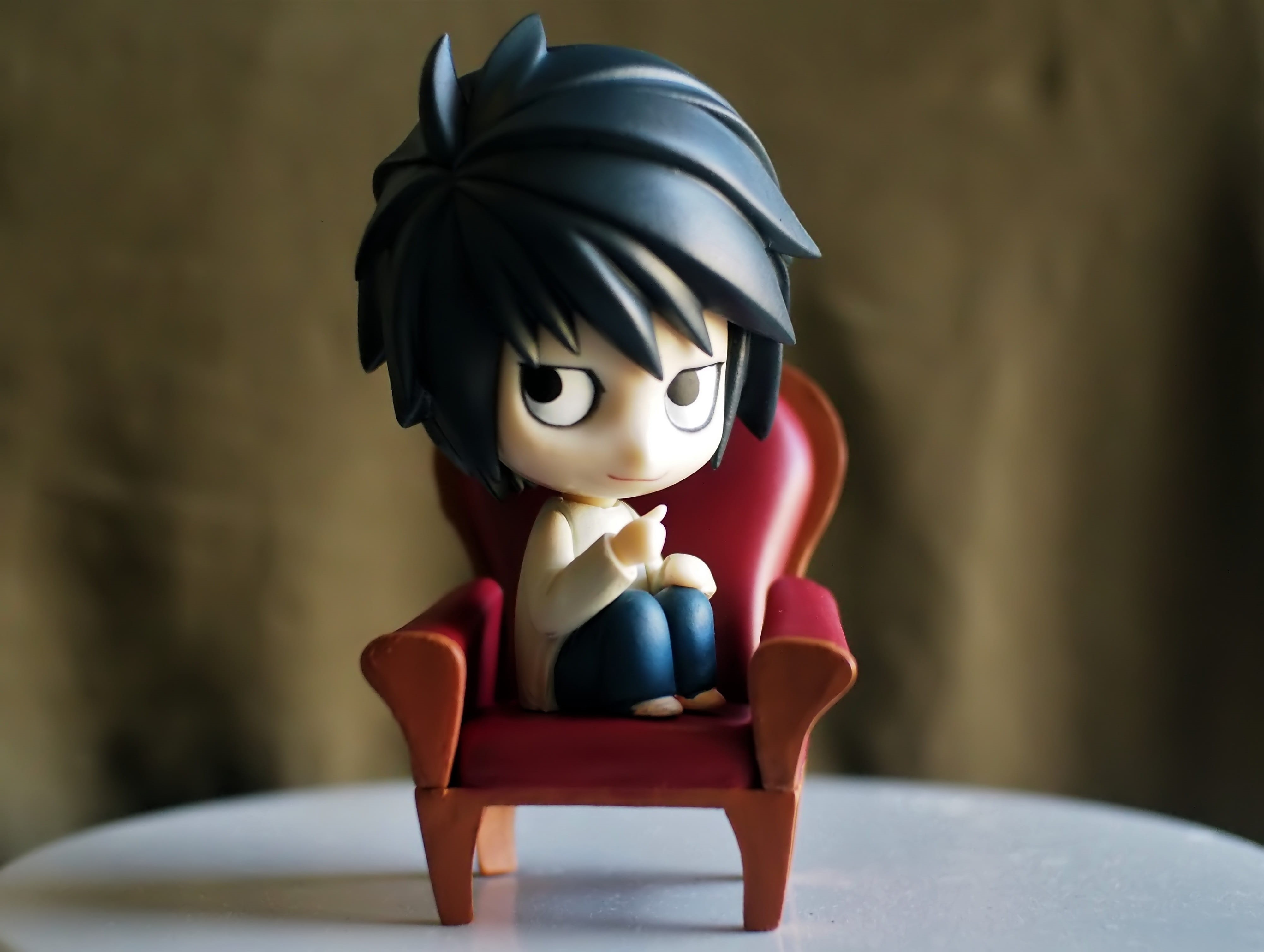 television, l, series, indoors, boy, chair, young, sit, table, cartoon, toy, action, nendoroid, male likeness, red, focus on foreground, no people, male, HD Wallpaper