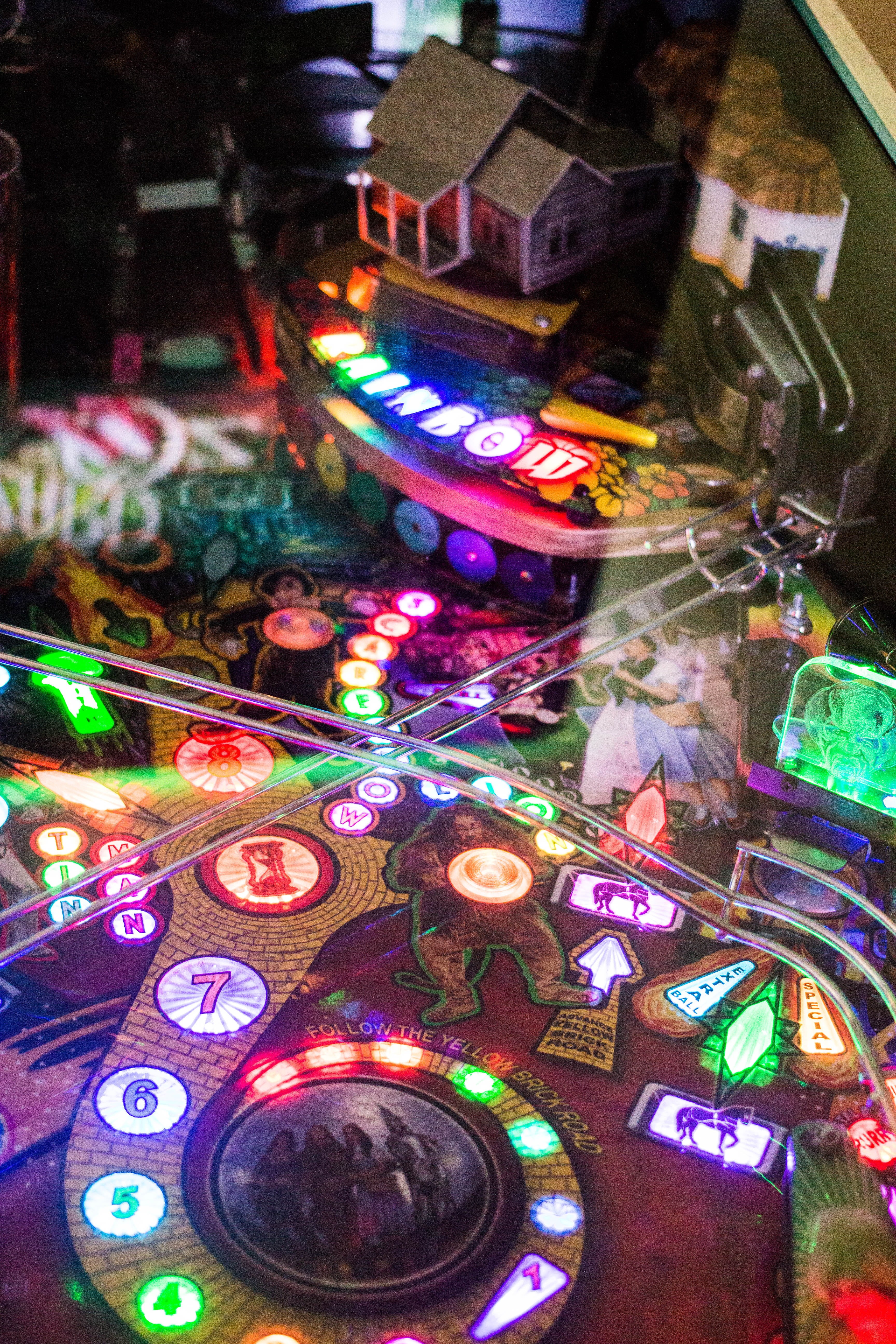 excitement, pinball, illuminated, table, nightlife, 5K, chief coffee, night, arcade, large group of objects, games arcade, multi colored, high angle view, Phone HD Wallpaper