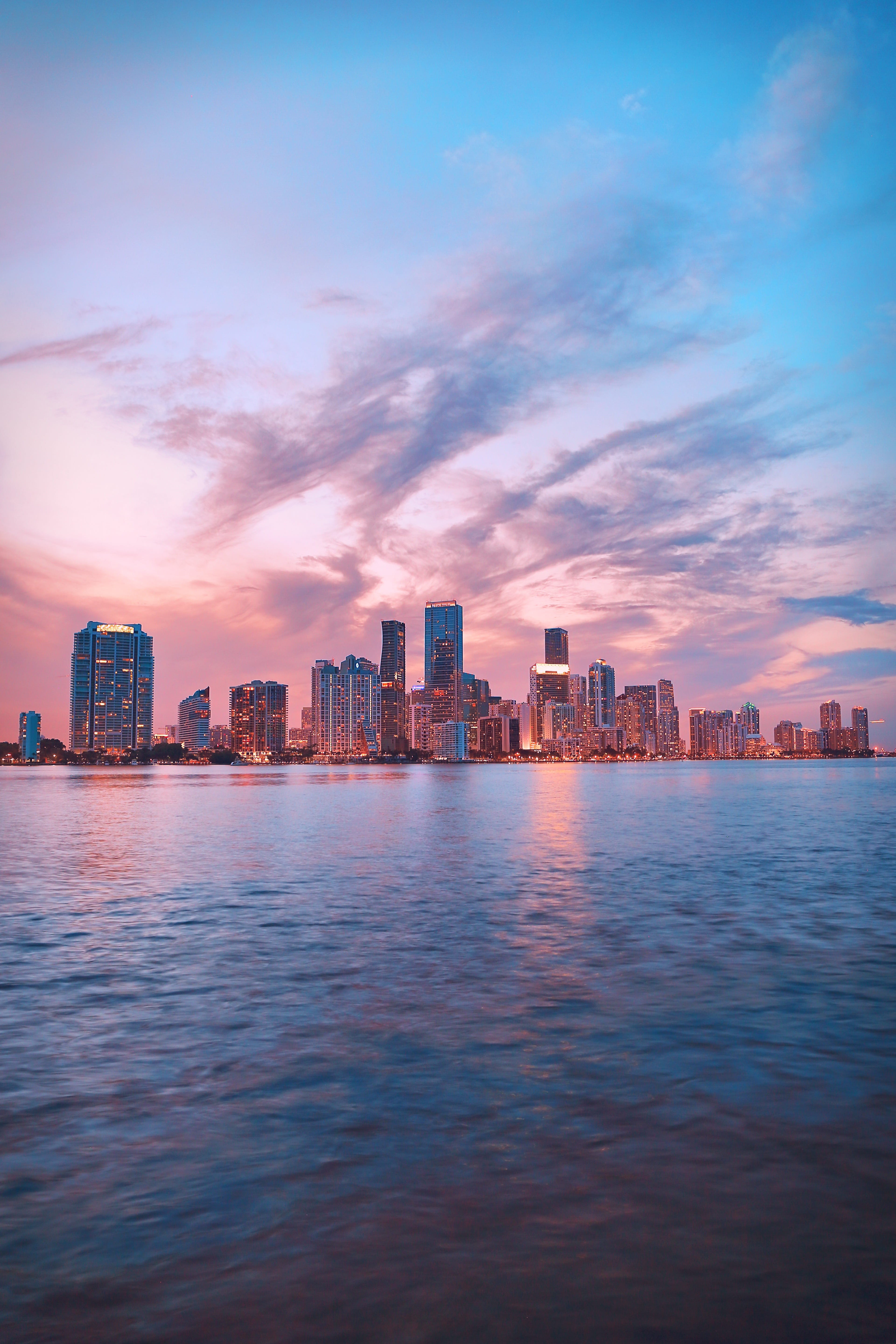urban, skyline, twilight, near, urban Scene, high, south beach, night, cityscape, urban Skyline, cloud, uSA, city, built Structure, rise, water, evening, Phone HD Wallpaper