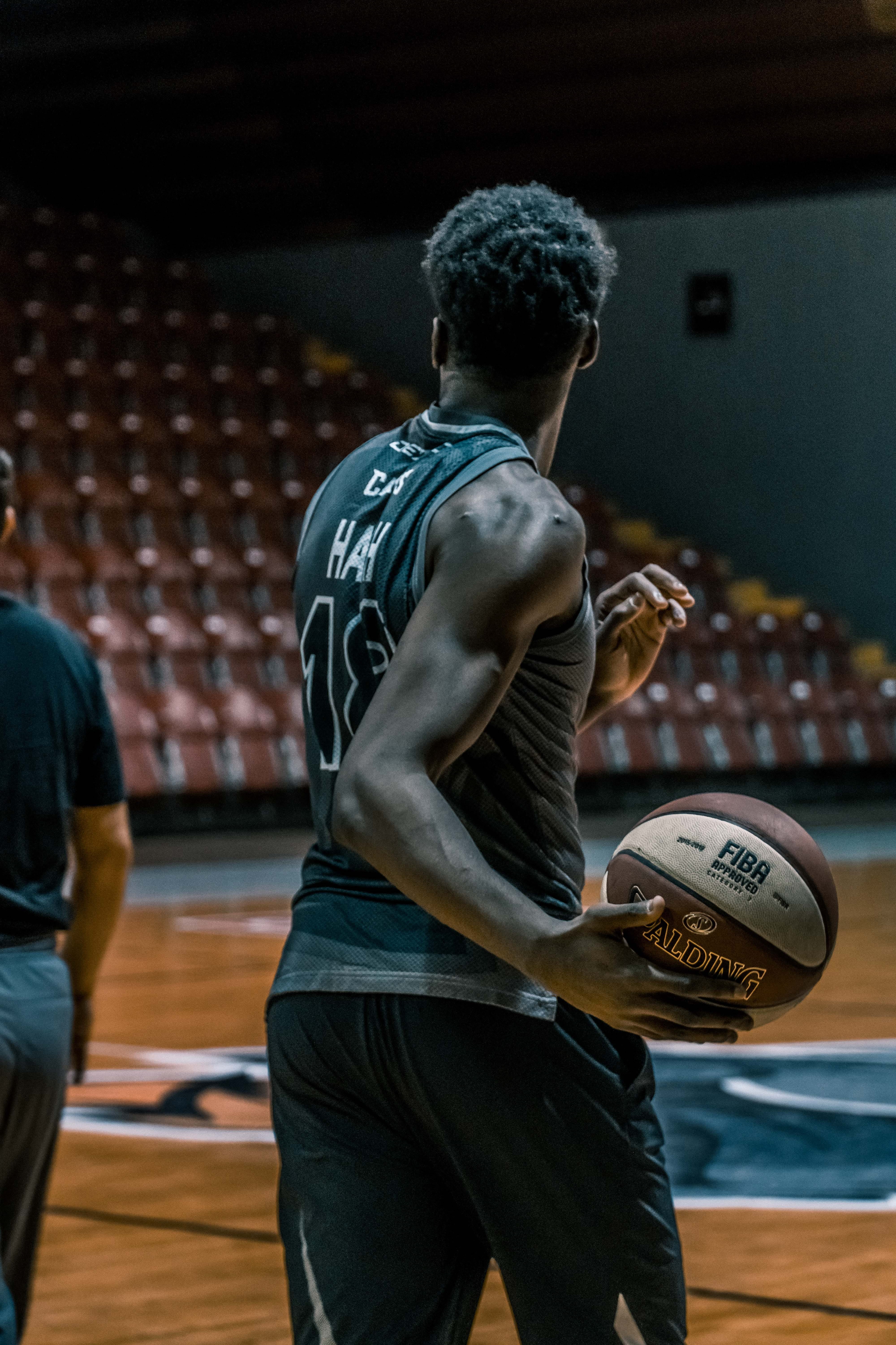 standing, indoors, fiba, player, man, sportsman, jersey, uniform, curly hair, competition, holding, athlete, lifestyles, basketball - sport, wear, three quarter length, Phone HD Wallpaper