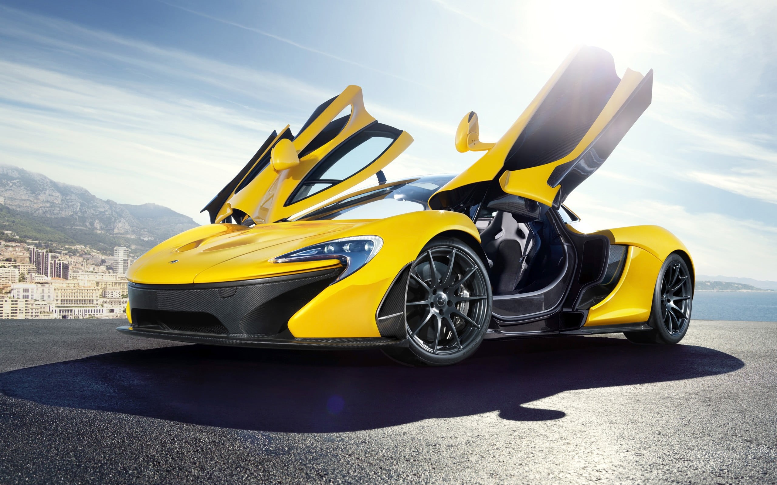 day, car, racecar, sunlight, McLaren P1, transportation, vehicle, sport, motor vehicle, sports race, yellow, sports, mode of transportation, road, no people, HD Wallpaper