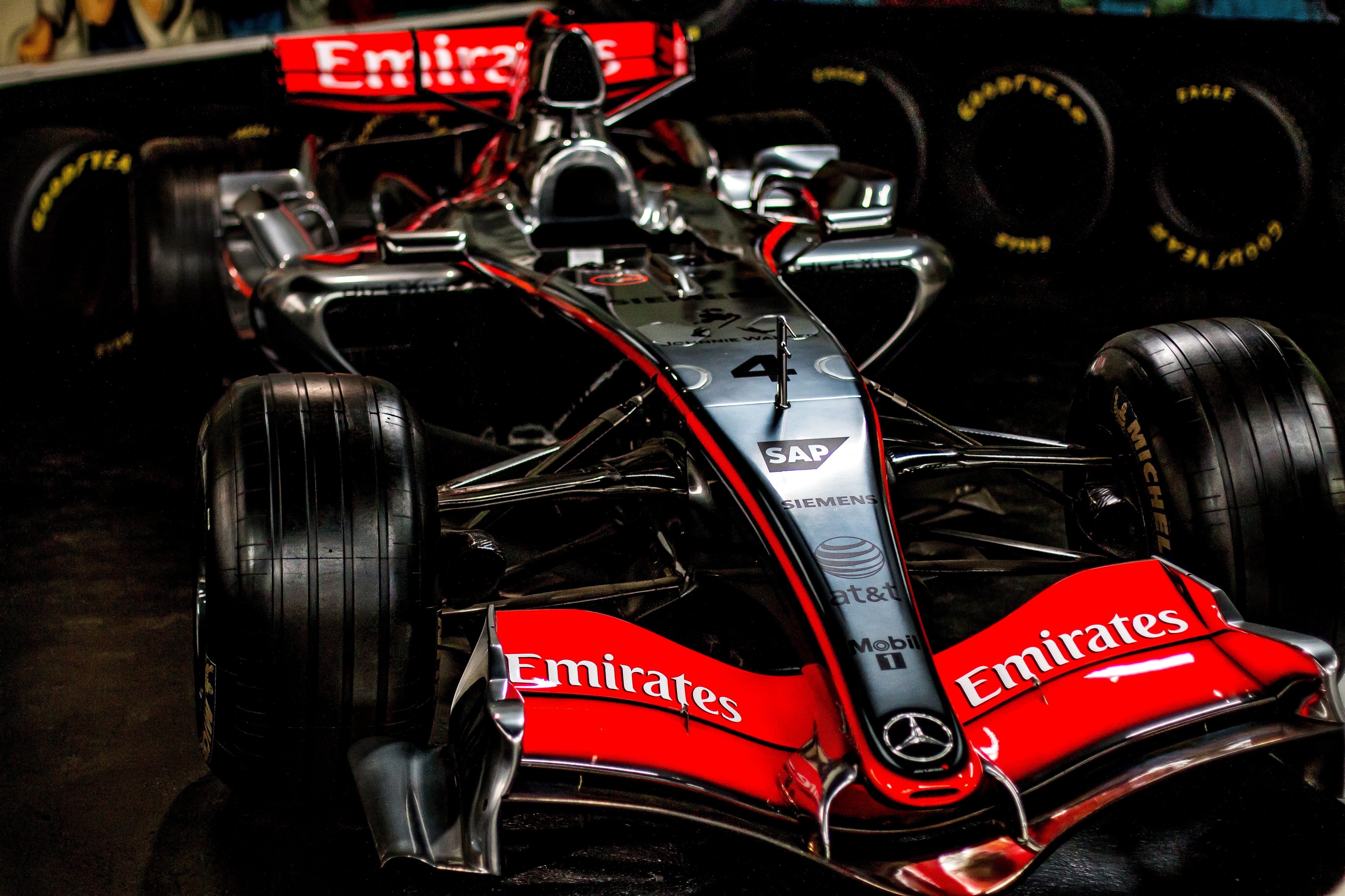 retro styled, vehicle part, champion, vehicle, day, black, wheel, competition, mclaren, mode of transportation, formula, indoors, western script, racing, HD Wallpaper
