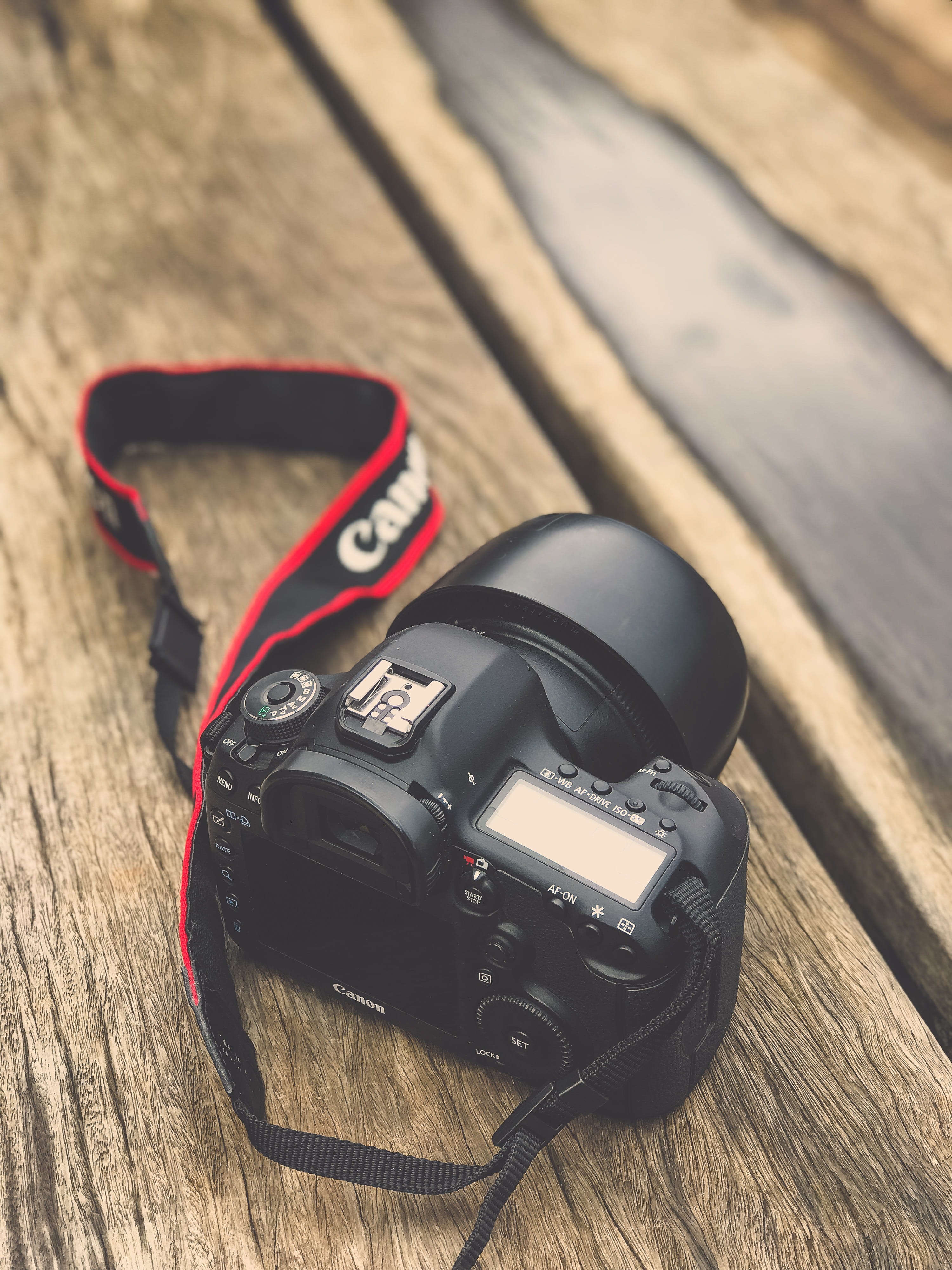 camera - photographic equipment, high angle view, largo sen. raul cardoso, technology, footwear, digital camera, strap, wood - material, photography, brazil, Phone HD Wallpaper