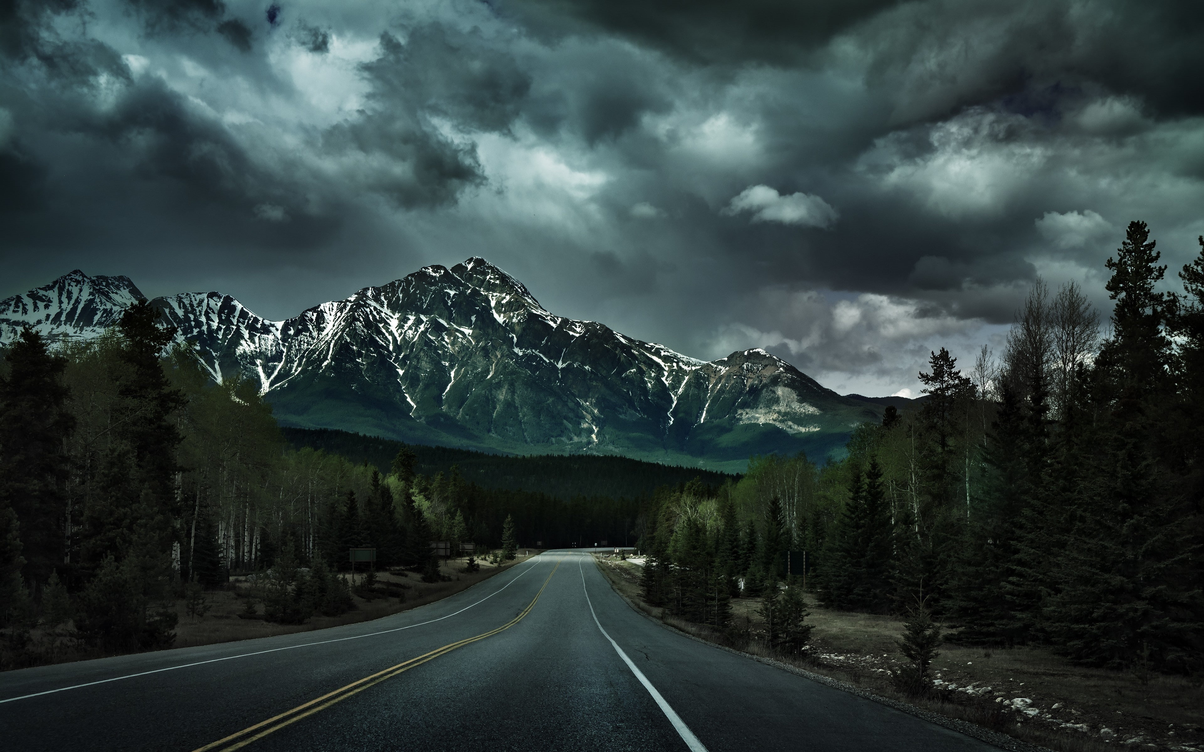 clouds, Canada, road, trees, forest, 4K, mountains, landscape, nature, lines, road sign, dark, hills, pine trees, snowy peak, HD Wallpaper