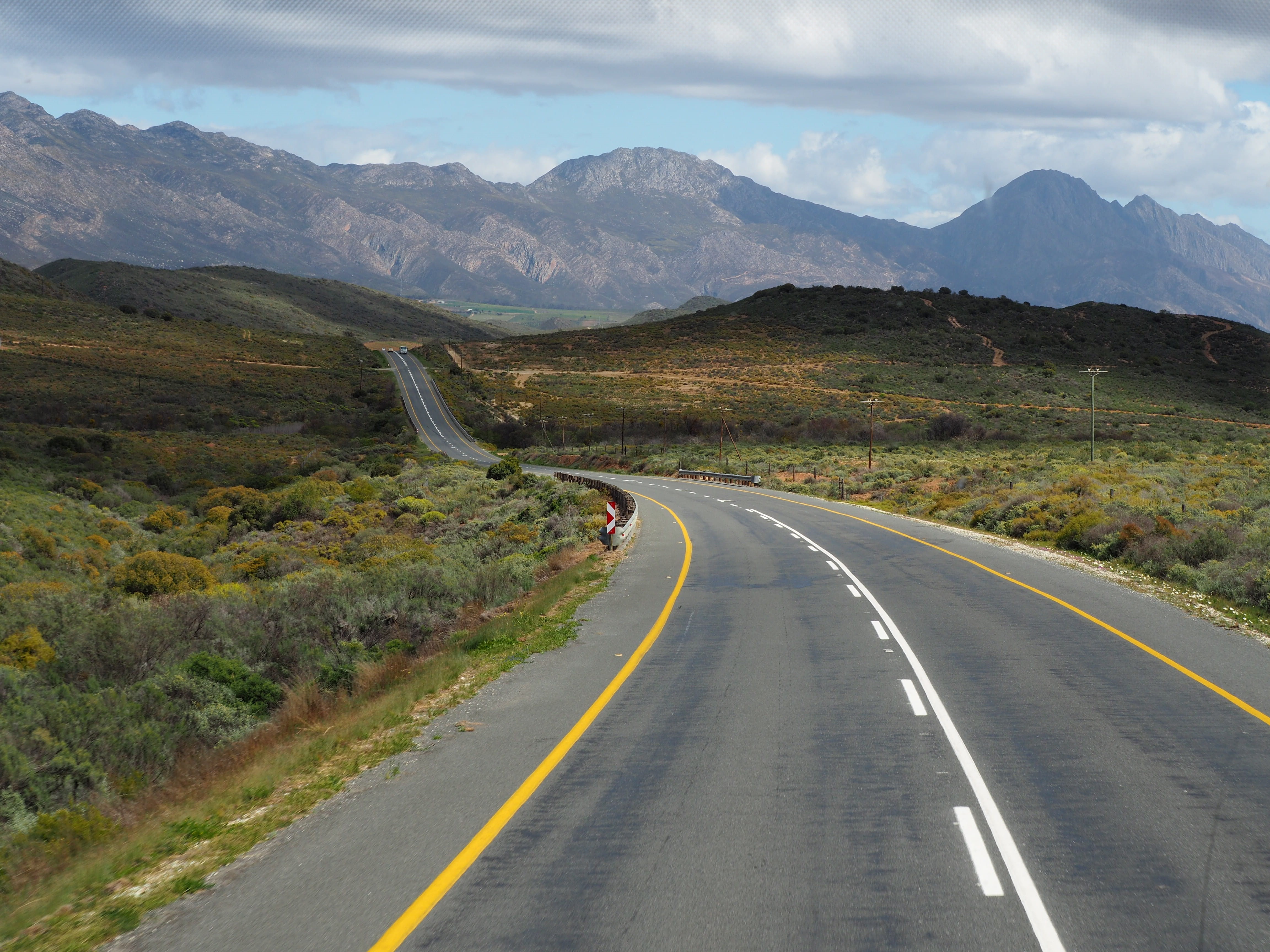 highway, diminishing perspective, plateau, dirt road, mountain, marking, symbol, south africa, slope, bird, sign, scenics - nature, no people, the way forward, HD Wallpaper