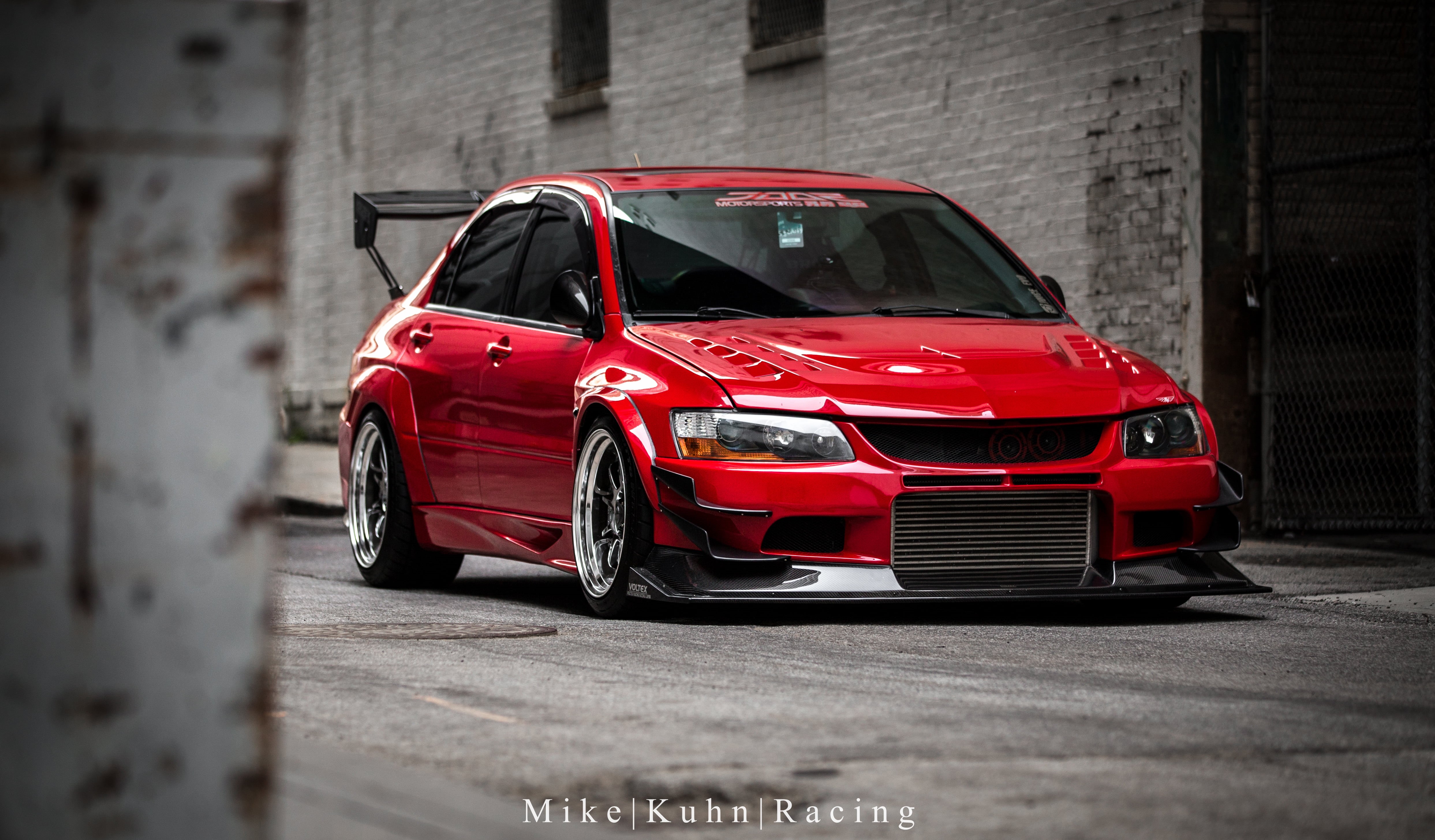 no People, luxury, land Vehicle, red, power, outdoors, evolution, sports Car, mini Cooper, mode of transportation, built structure, sedan, modern, mitsubishi, HD Wallpaper