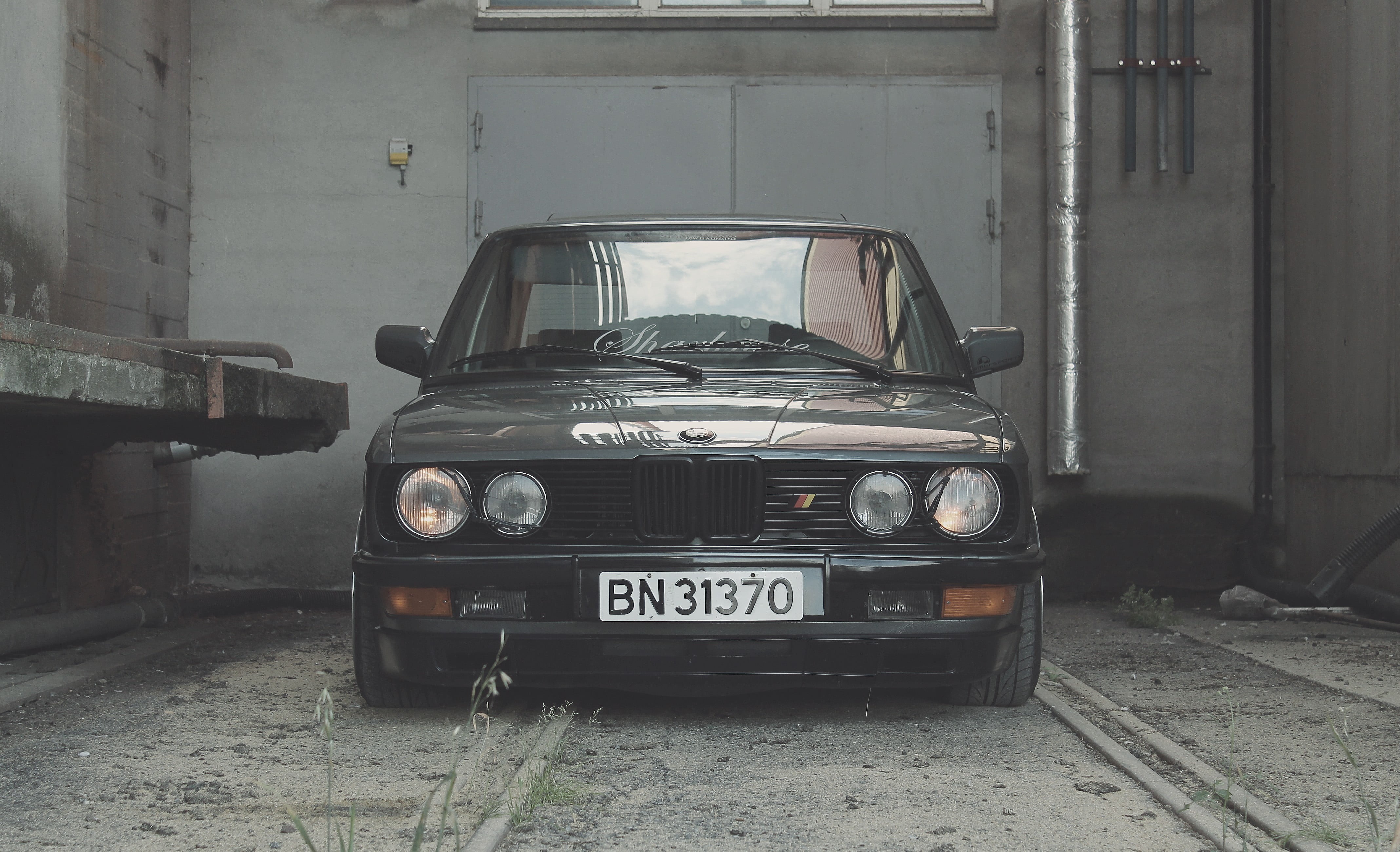 Norway, no people, western script, motor vehicle, mode of transportation, text, land vehicle, front view, 4K, city, BMW, communication, day, vintage car, HD Wallpaper