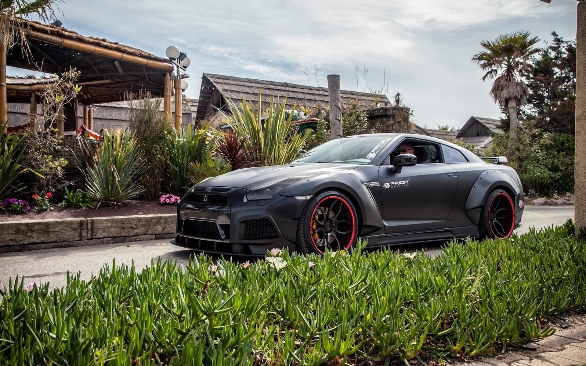 outdoors, Nissan GT-R R35, day, 1080P, tropical climate, no people, architecture, nature, Prior Design, sky, luxury, motor vehicle, plant, green color, HD Wallpaper