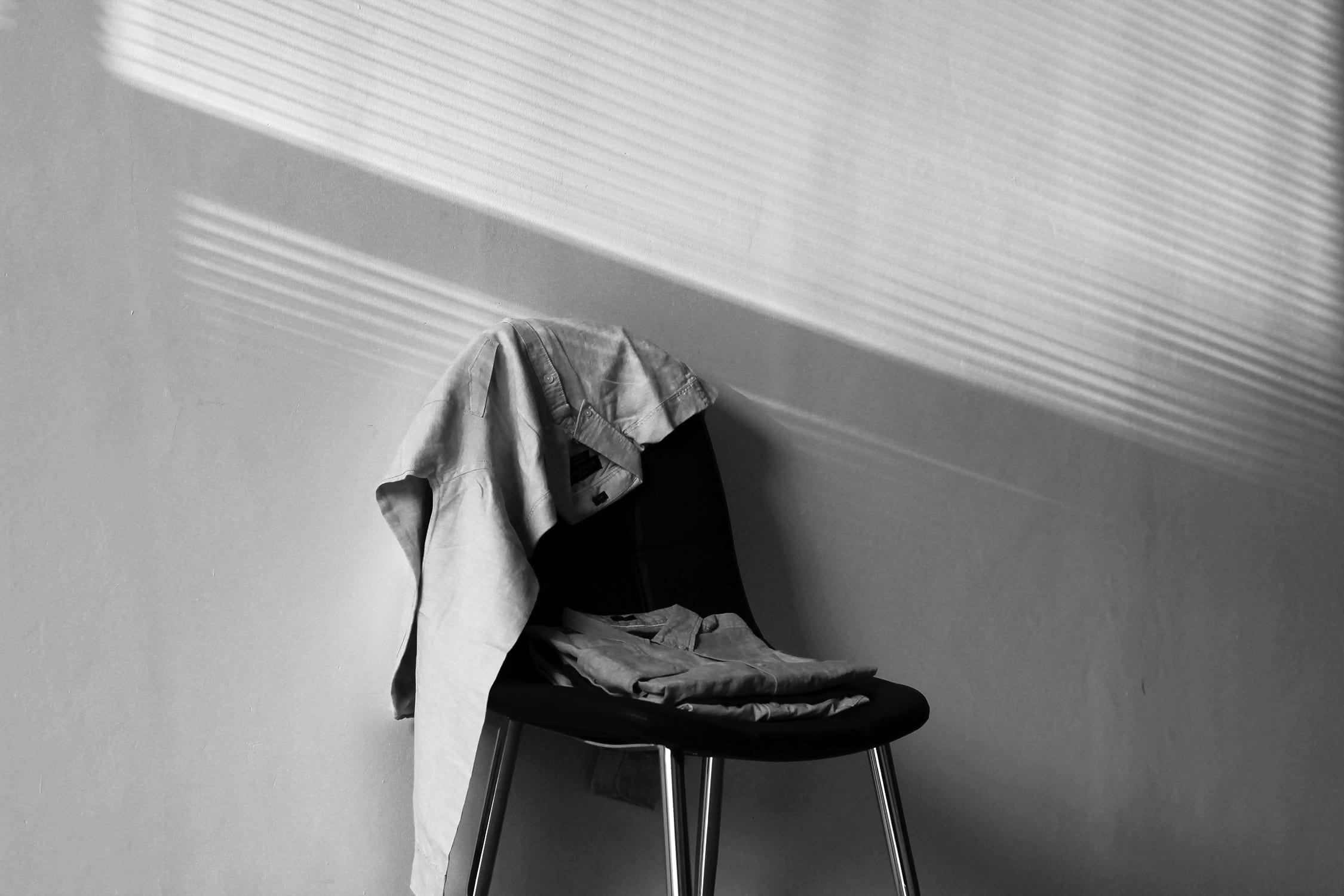laundry, textile, no people, indoors, black-and-white, men clothes, lifestyle, table, shirt, chair, shadows, hanging, black, careless, minimalism, copy space, HD Wallpaper