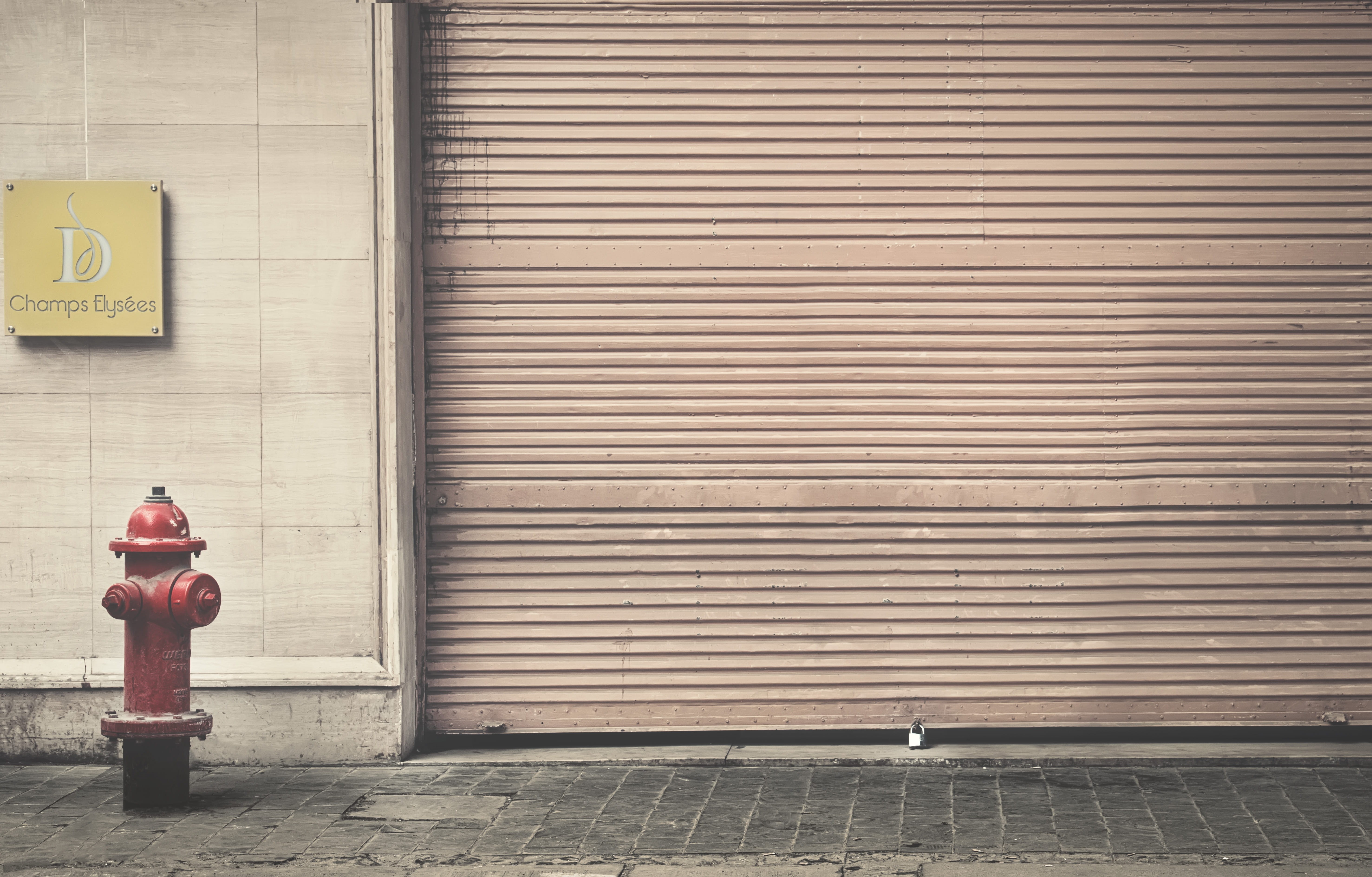 curtain, shutter, sidewalk, security, 5K, closed, wall - building feature, footpath, brick, street, day, architecture, red, apparel, fire, shorts, walkway, HD Wallpaper