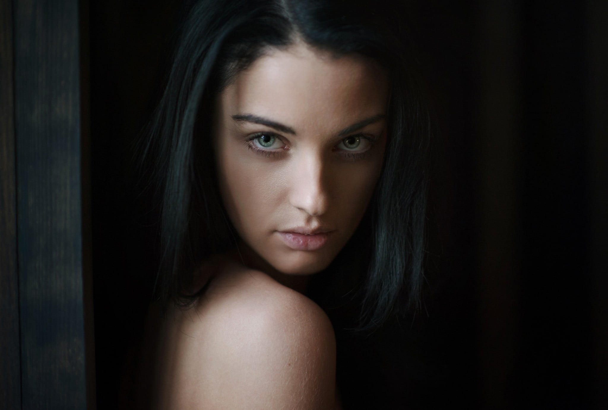 hair, looking at camera, adult, indoors, sadness, hairstyle, black background, beauty, human body part, portrait, emotion, 1080P, close-up, brunette, studio shot, HD Wallpaper