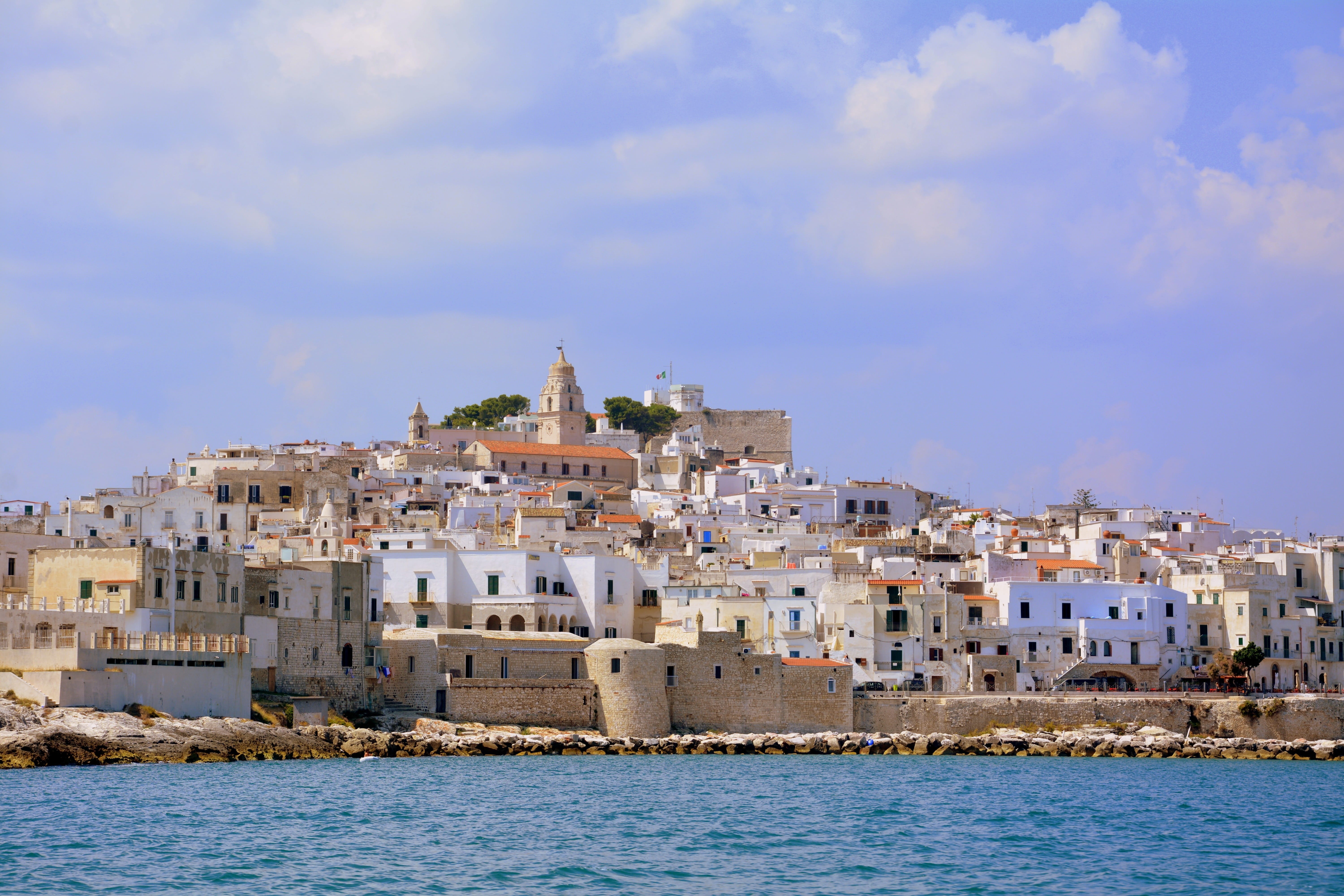 5K, nature, sea, blue, promontory, houses, outdoors, gargano, waterfront, townscape, puglia, rock, built structure, vieste, town, water, costa, day, house, HD Wallpaper