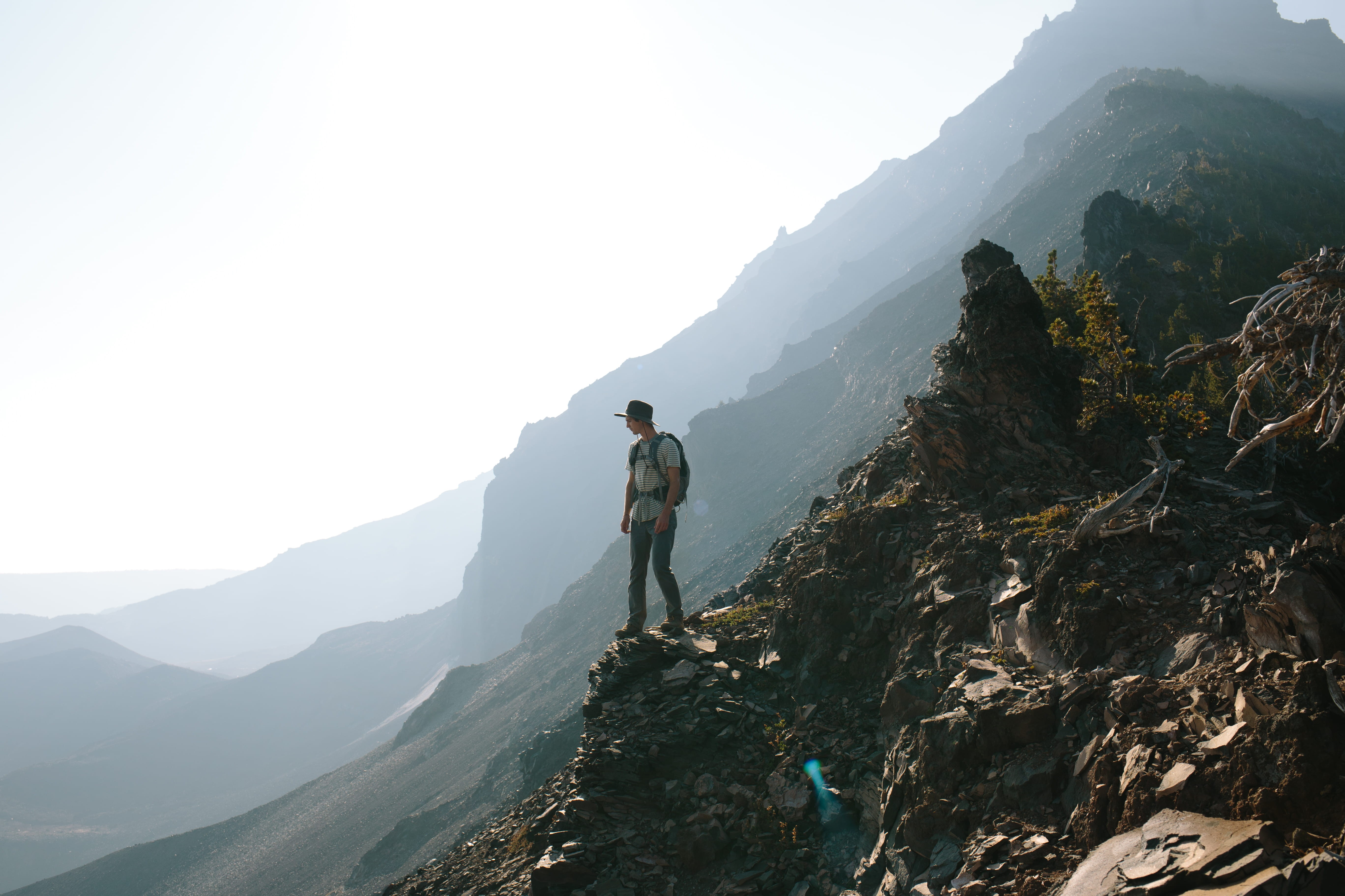 activity, full length, walking, mountain, sky, beauty in nature, mountain range, one man only, monolith, outdoors, adventure, adult, non-urban scene, hike, HD Wallpaper