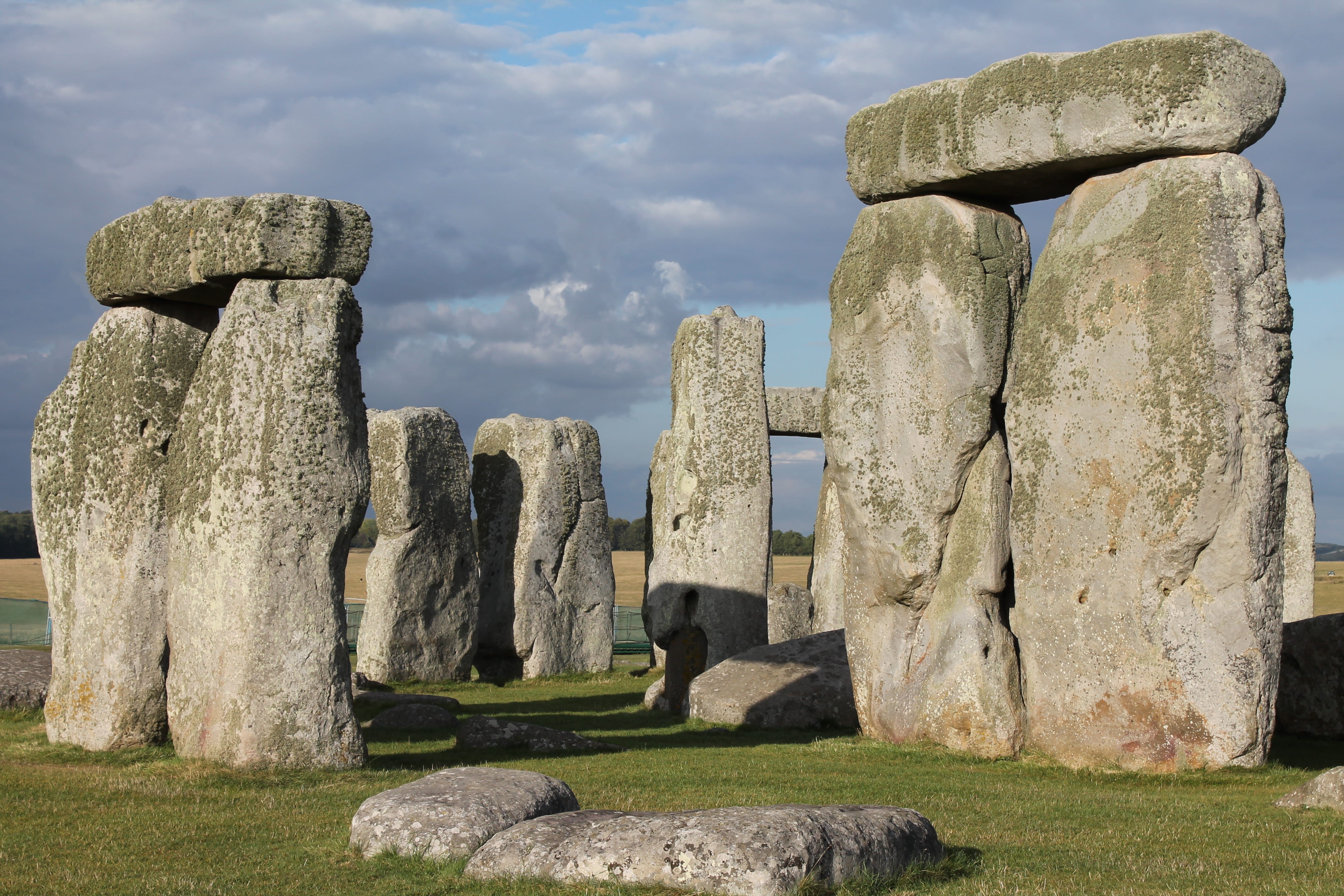rocks, monolith, cemetery, stone material, cloud - sky, history, ancient, day, no people, mystery, rock, shadow, outdoors, art, prehistoric, old ruin, grassland, HD Wallpaper