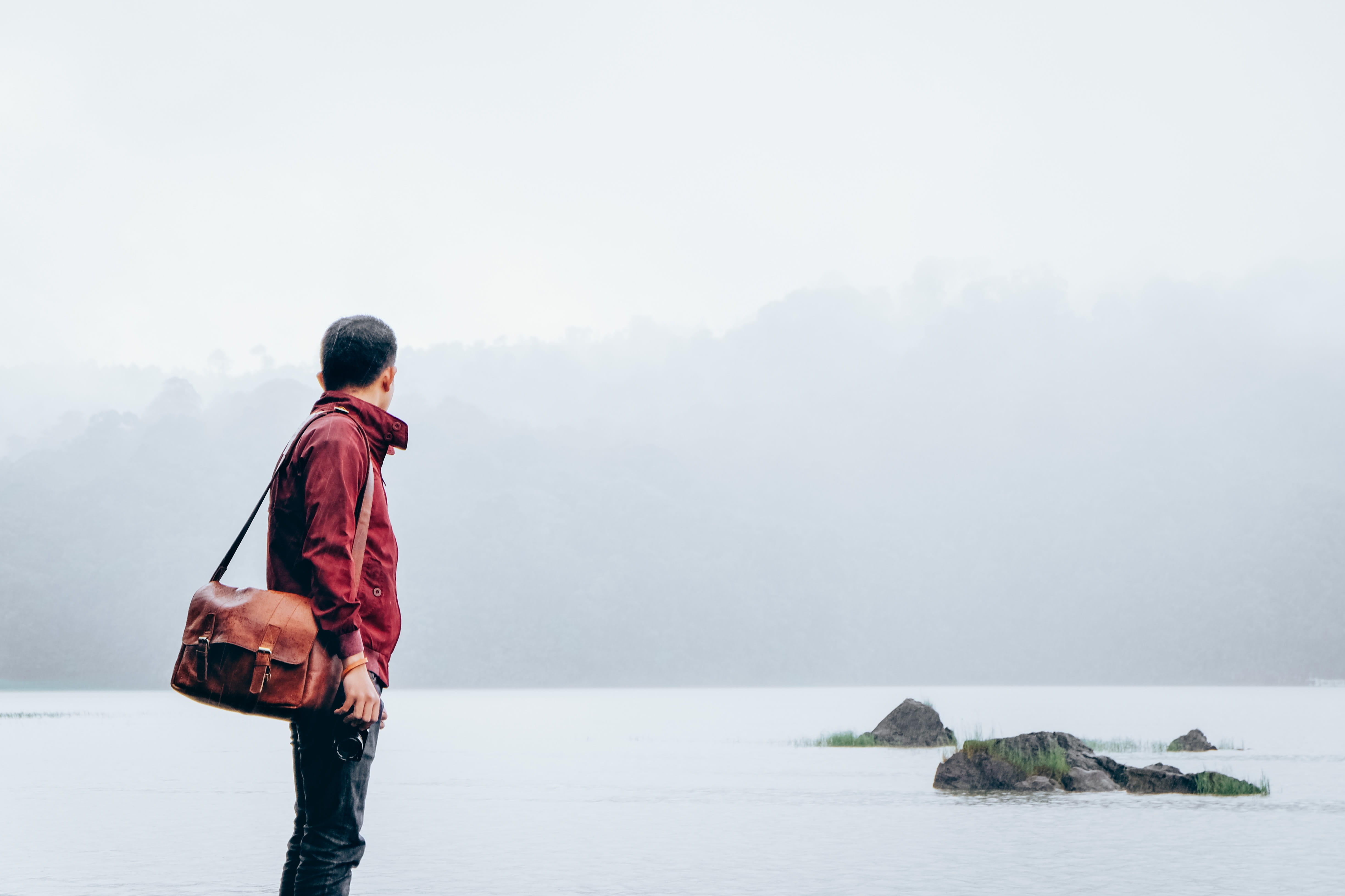 leisure activity, image Technique, color Image, standing, adults Only, looking, men, sky, near, solitude, red jacket, real people, towards, 4K, backpack, HD Wallpaper