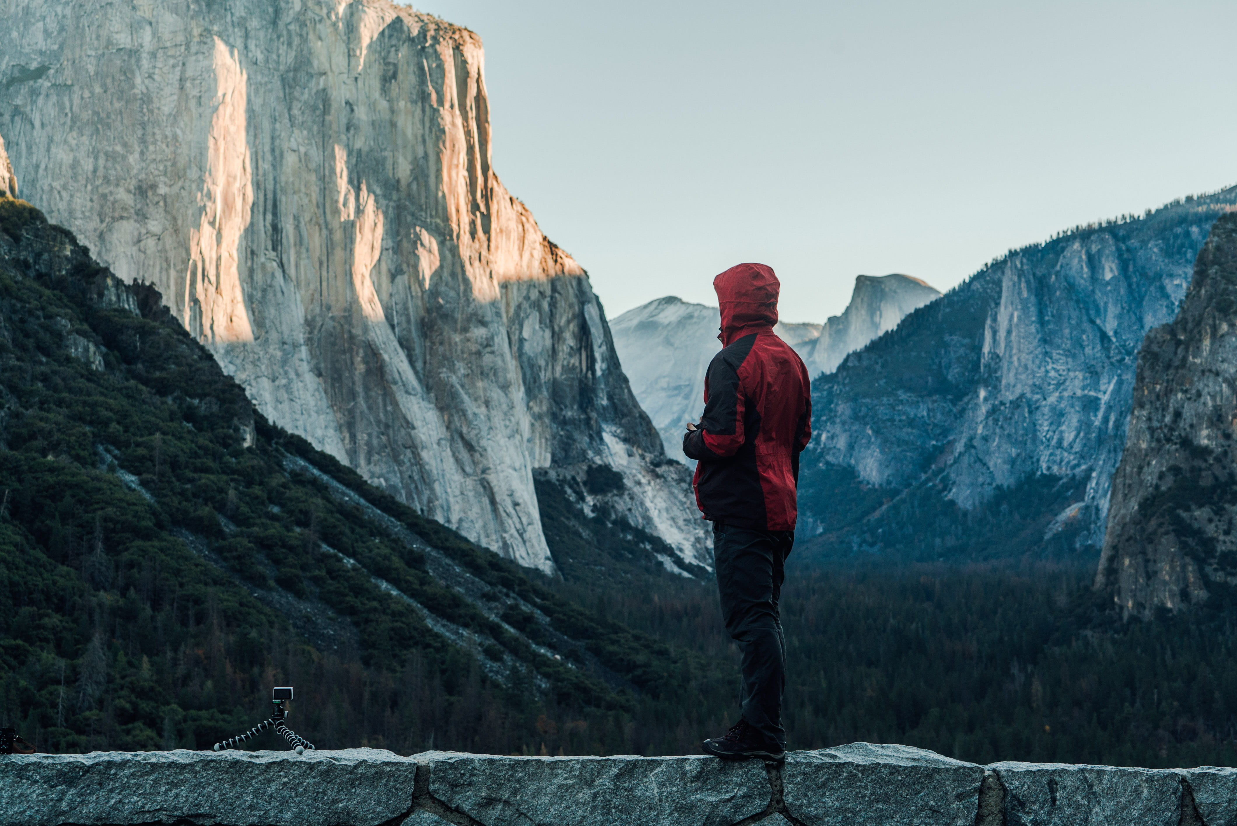 wearing, rock, usa, environment, jacket, sky, outdoors, concrete, adult, brown, gorillapod, mountain range, rear view, mountains, full length, one person, HD Wallpaper
