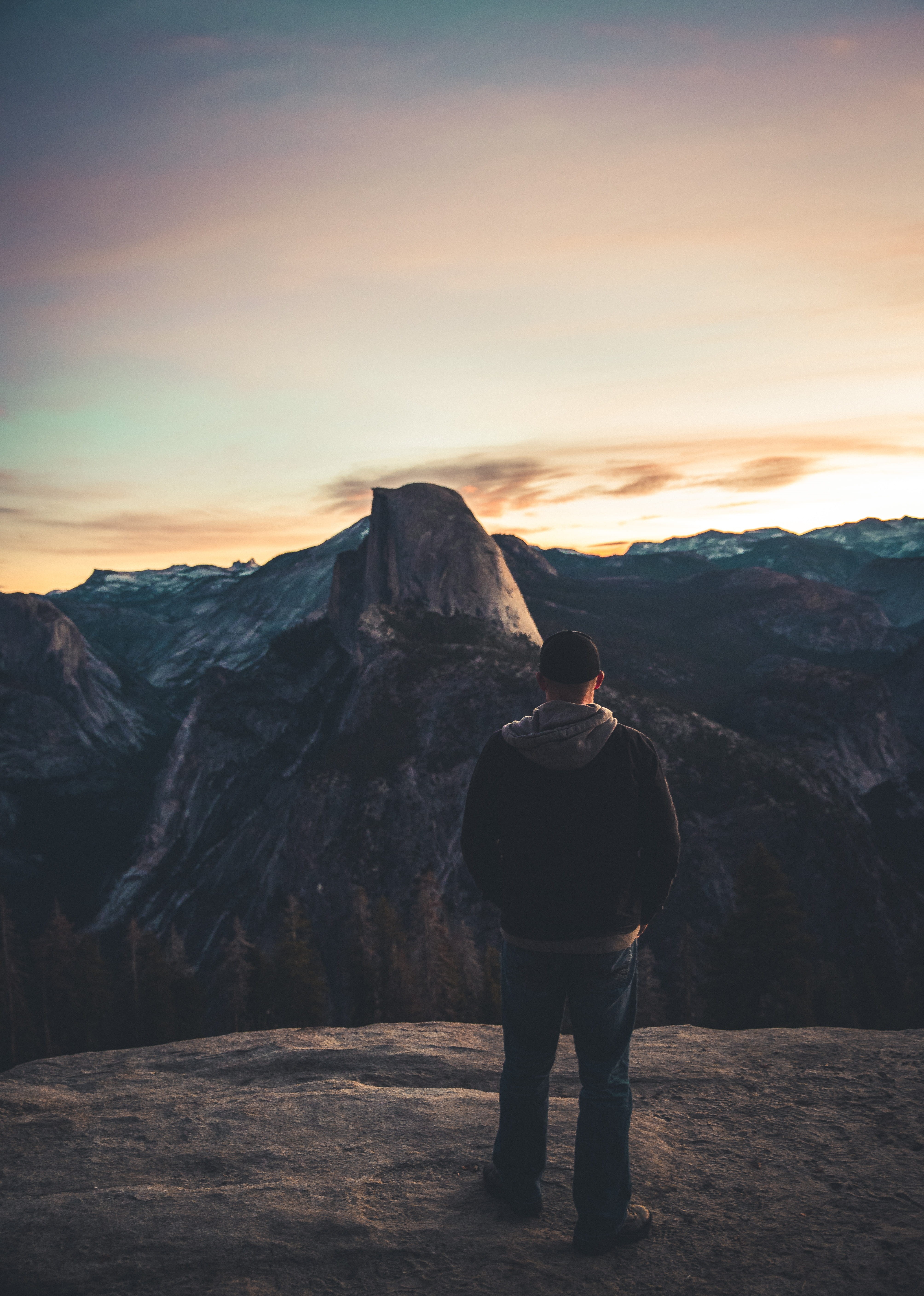 adventure, sunrise - Dawn, rock, nature, sunlight, outdoors, tourist, mountain, standing, adult, formation, 5K, journey, looking, sky, night, lifestyles, Phone HD Wallpaper