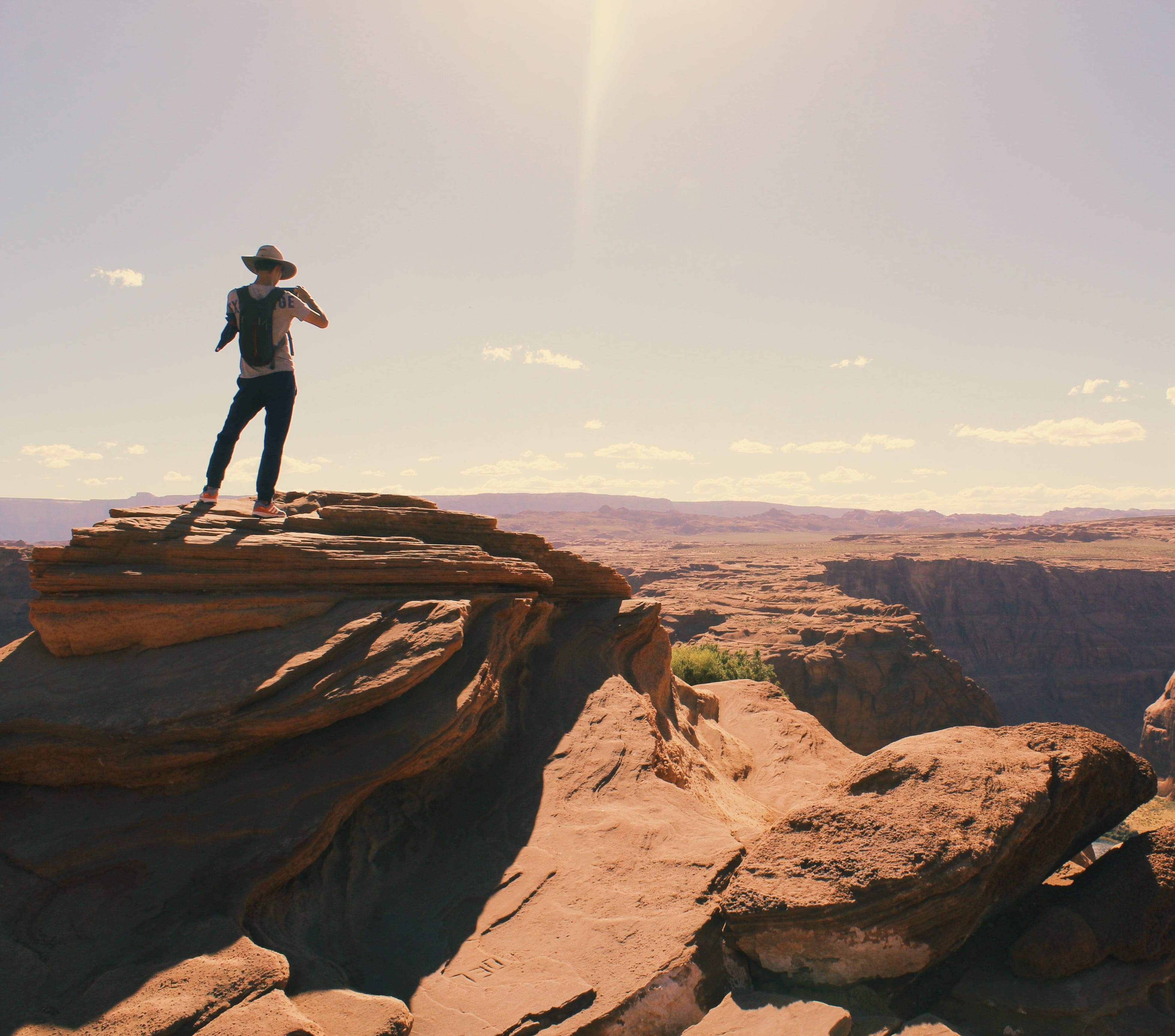 birds, hike, hiker, full length, climb, rock formations, looking at view, non-urban scene, clouds, mountain, adventure, real people, adult, landscape, high, HD Wallpaper