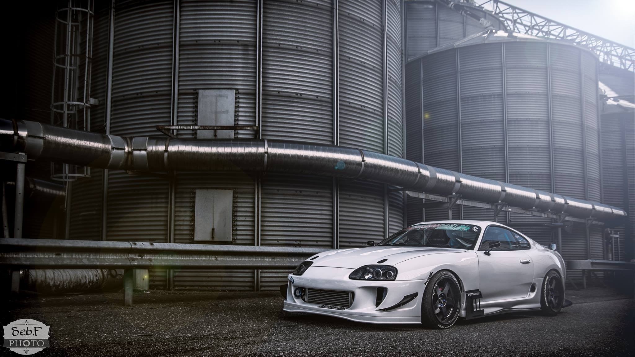 transportation, pipe - tube, metal, outdoors, city, building exterior, building, 1080P, no people, silver colored, sports car, skyscraper, industry, land vehicle, HD Wallpaper