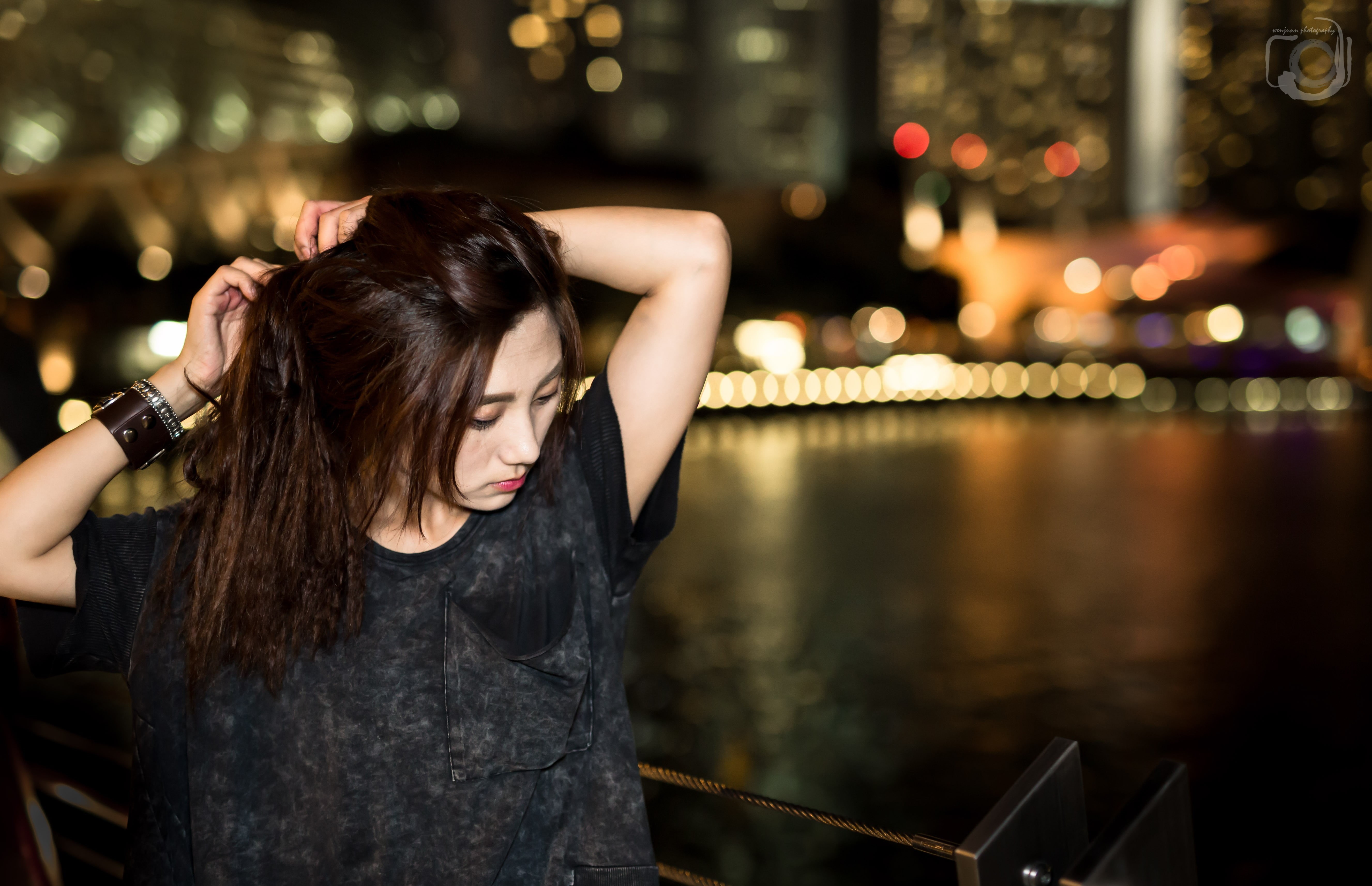 railing, focus on foreground, 5K, arms up, young adult, young women, Asian, brunette, hairstyle, beautiful woman, T-shirt, adult, hand in hair, illuminated, HD Wallpaper